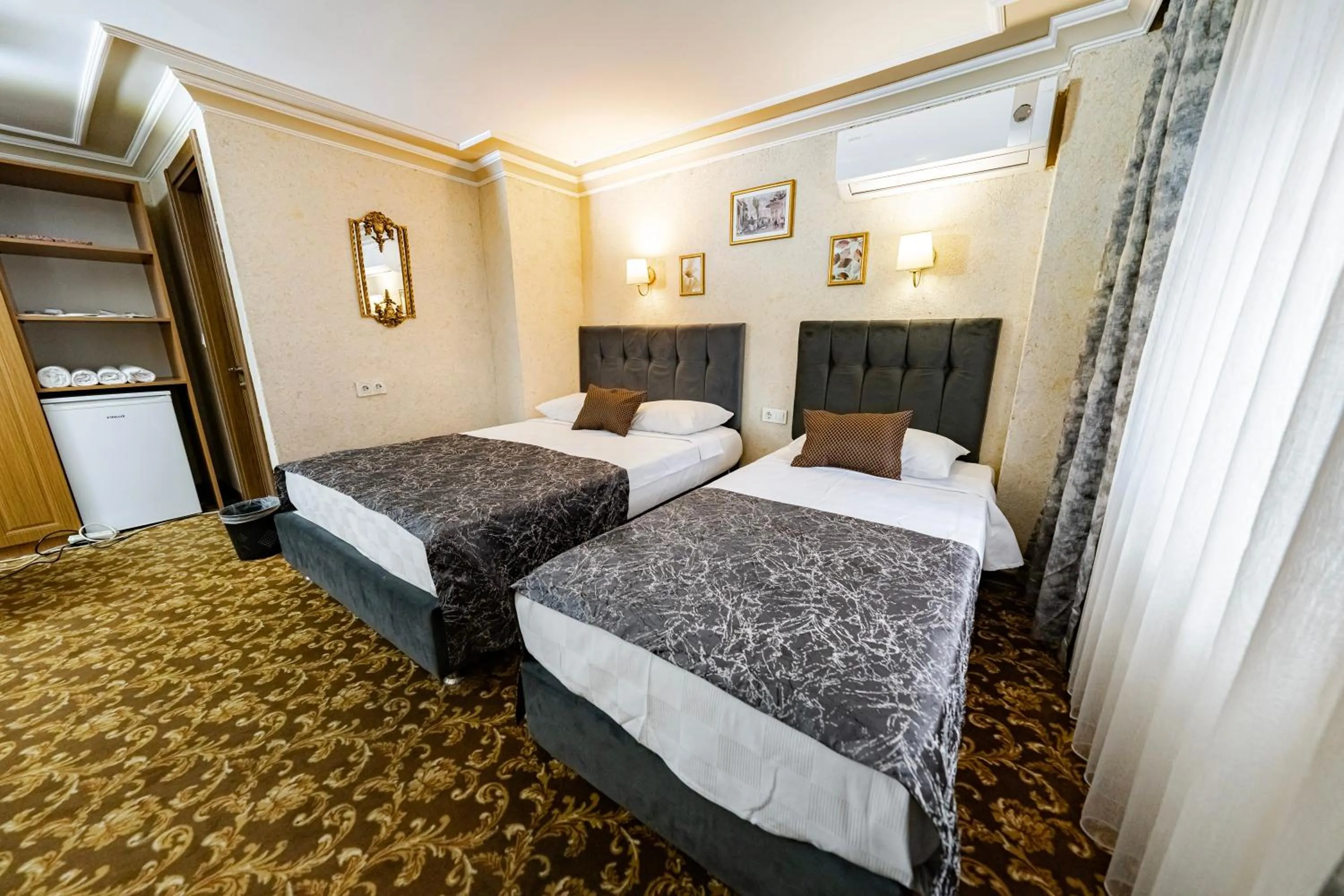 Photo of the whole room, Bed in Hamit Hotel Kizilay