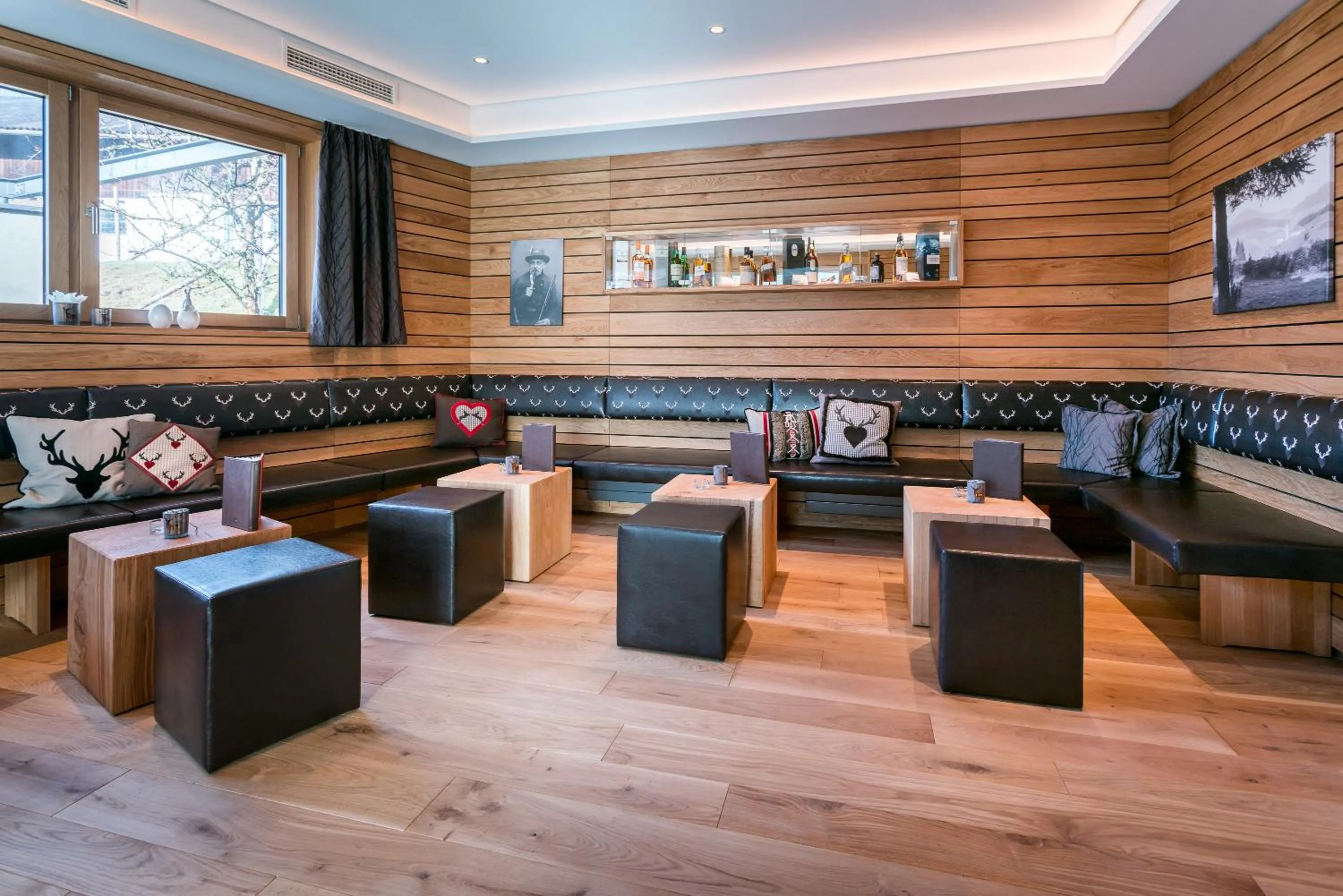 Communal lounge/ TV room in Naturparkhotel Adler