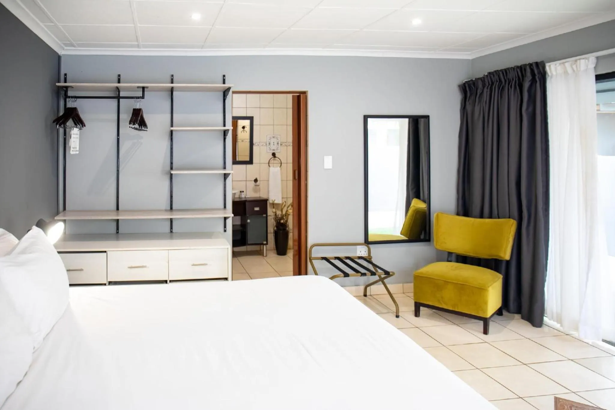 Seating area, Bed in BON Hotel Rustenburg