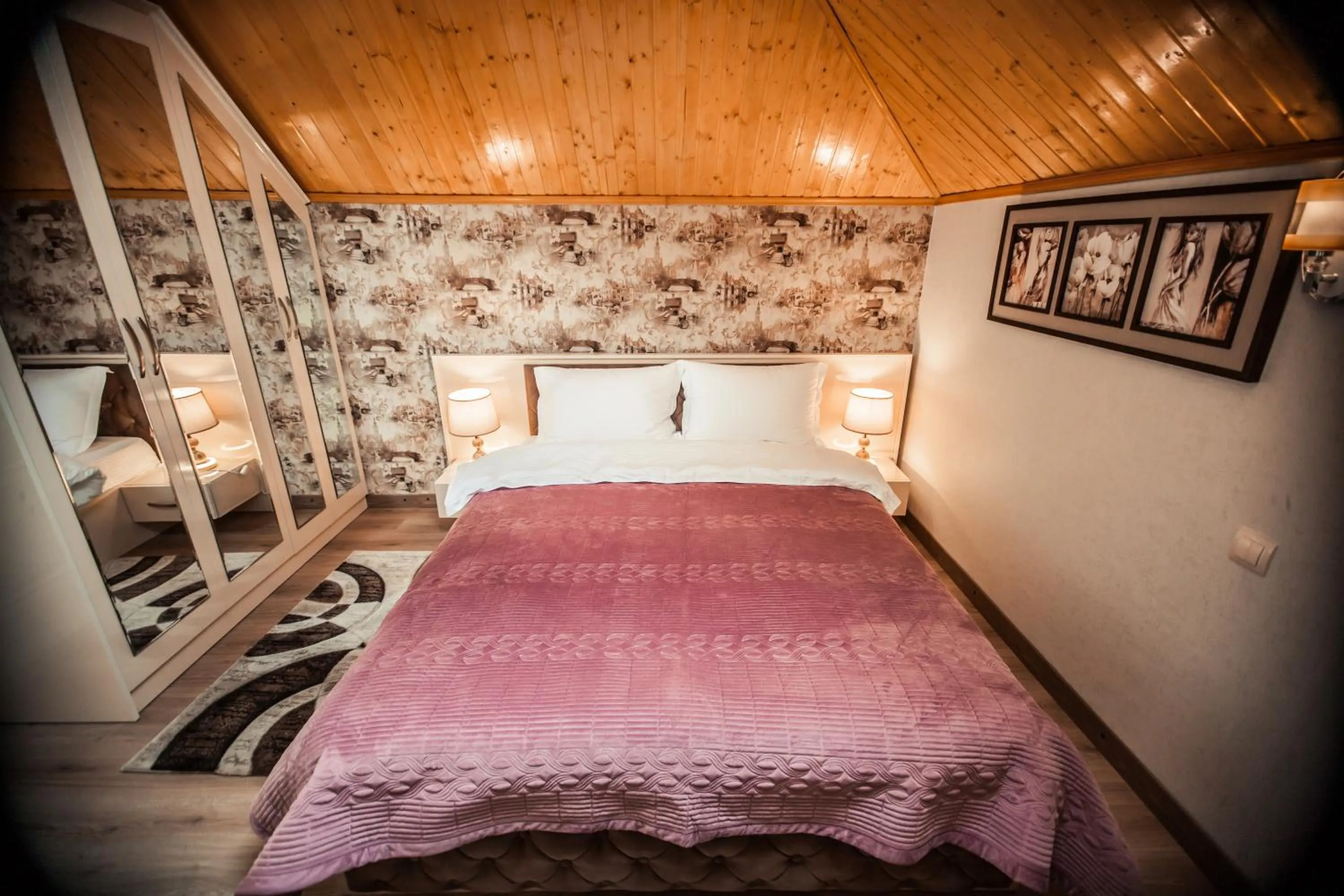 Bed in MUSMORE Boutique Hotel