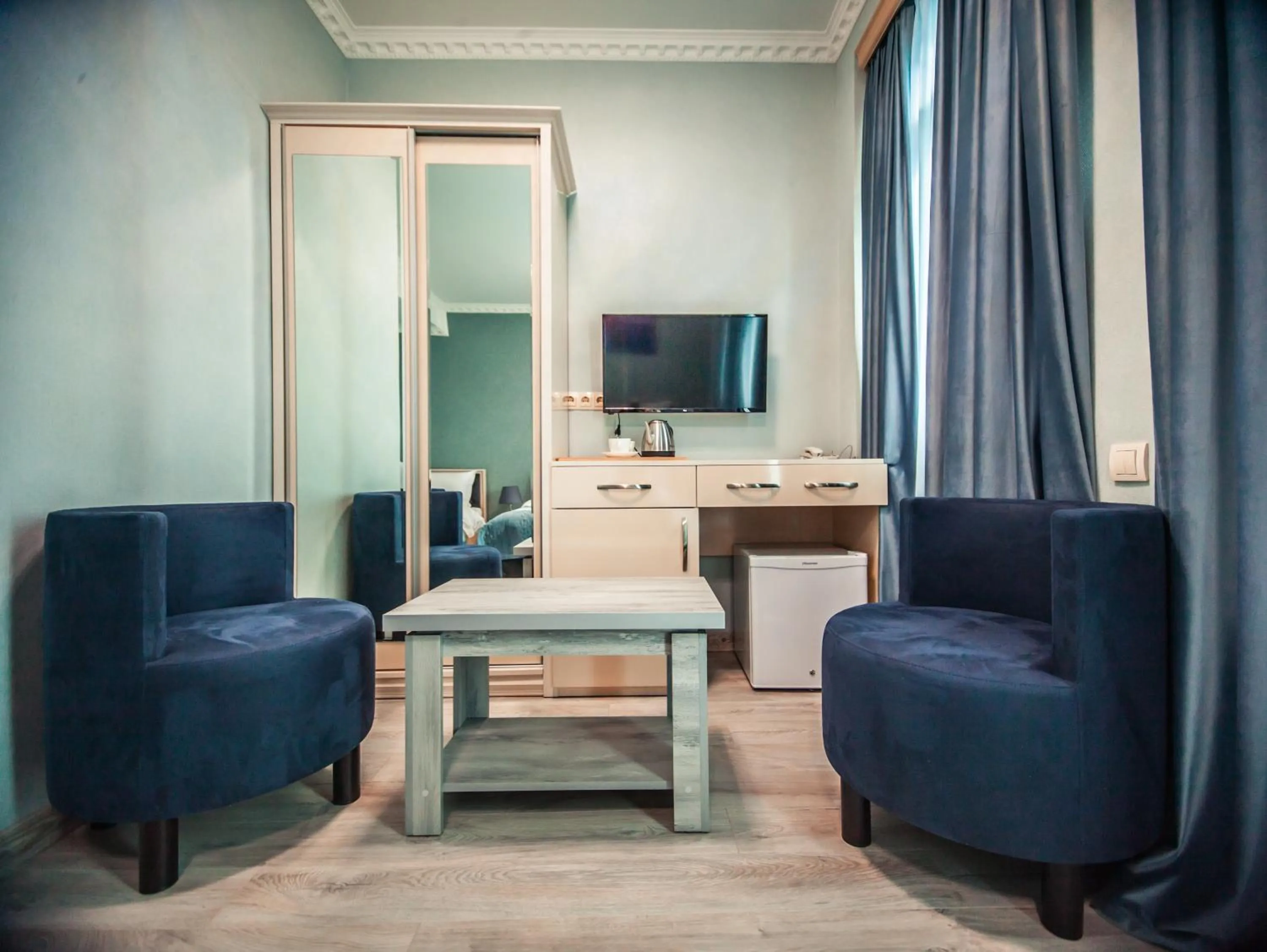 Seating area in MUSMORE Boutique Hotel