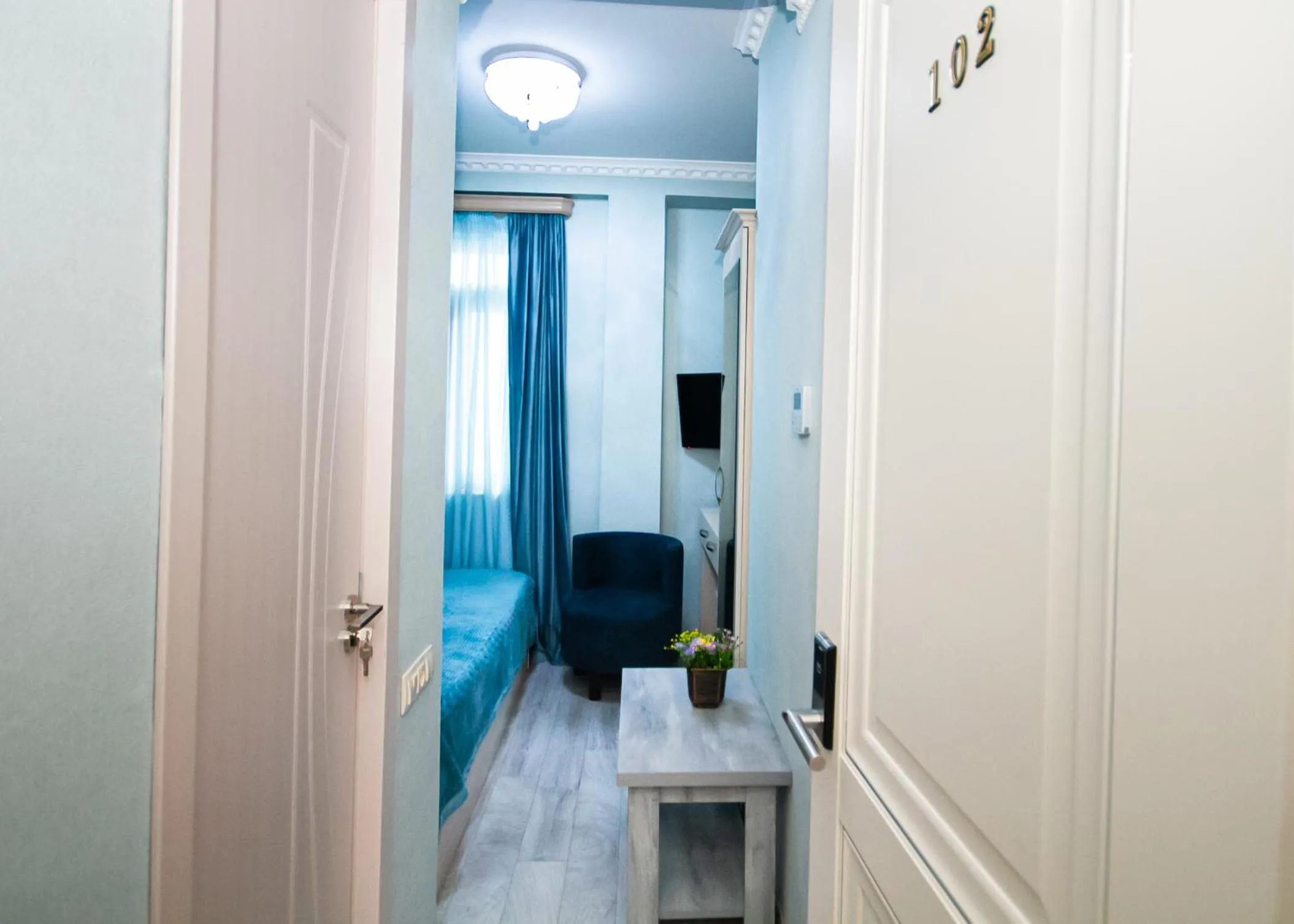 Bedroom in MUSMORE Boutique Hotel