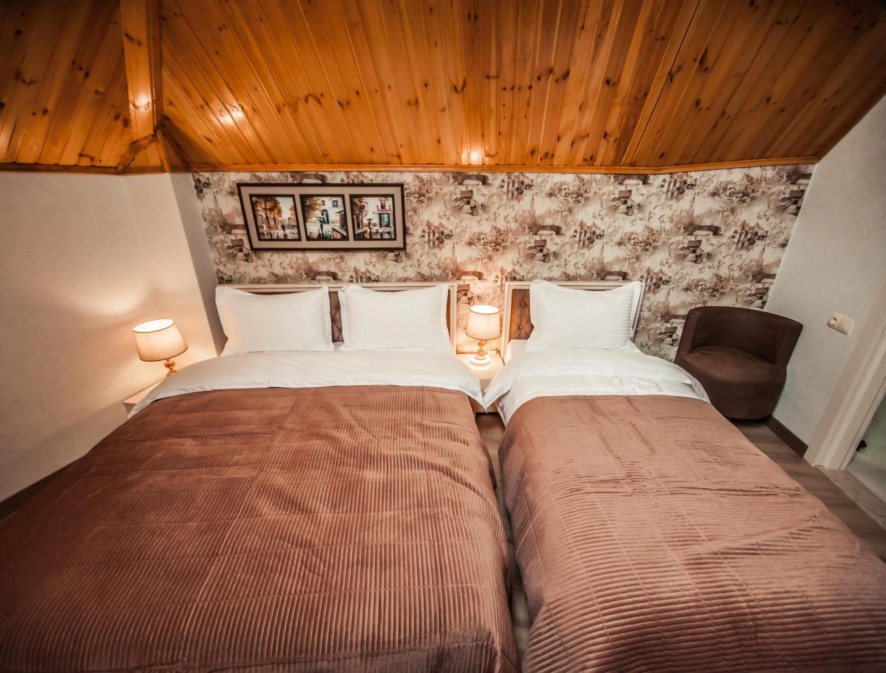 Bed in MUSMORE Boutique Hotel