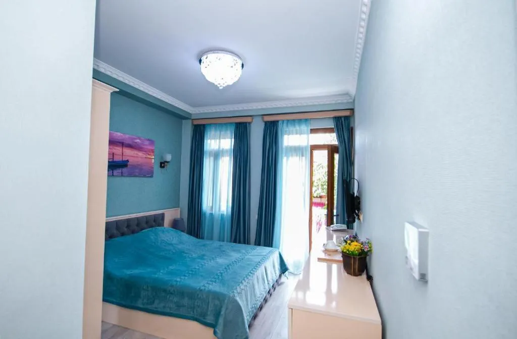 Bed in MUSMORE Boutique Hotel