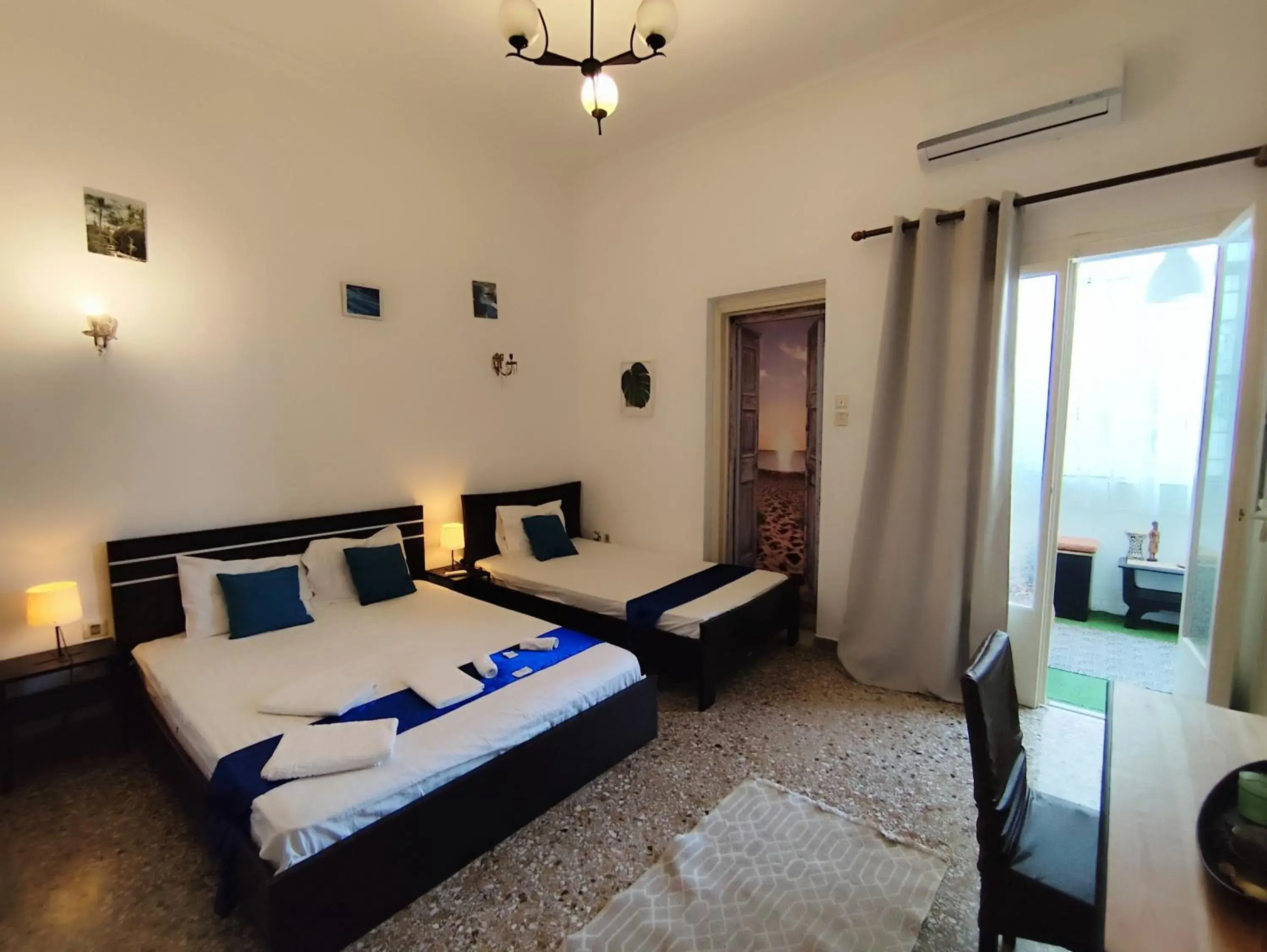 Basic Triple Room with Shared Bathroom in Cozy room in quiet neighbourhood Basic Triple Room with Shared Bathroom in Cozy room in quiet neighbourhood