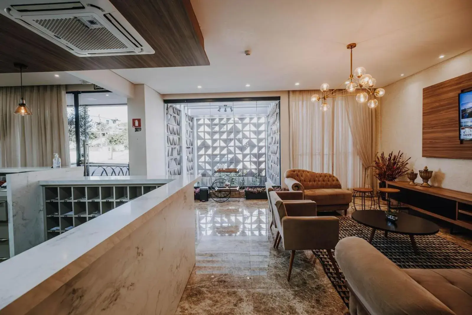 Living room in Arca's Executive Hotel Living room in Arca's Executive Hotel