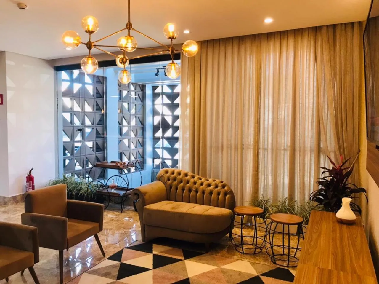 Living room in Arca's Executive Hotel