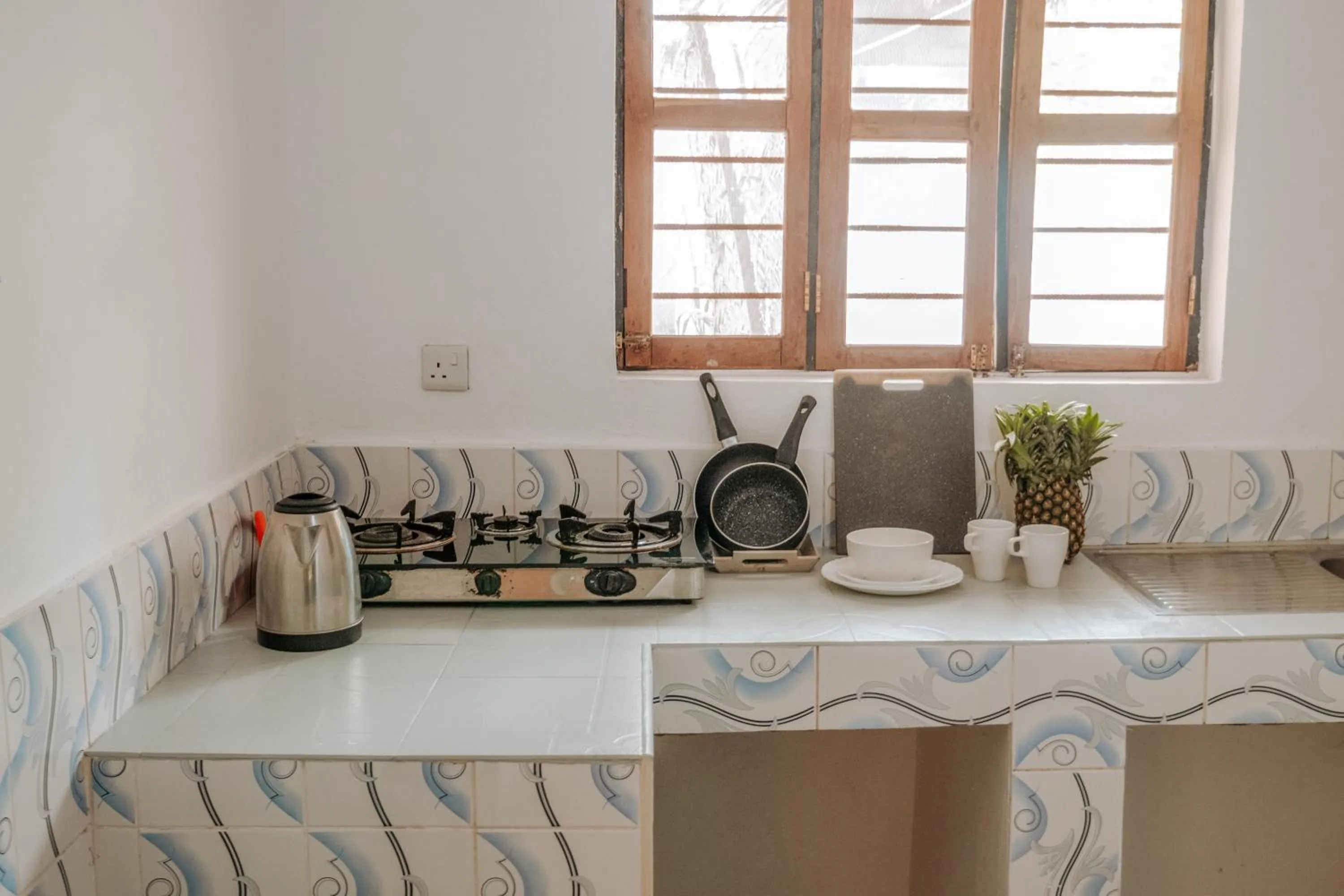 Kitchen or kitchenette in Zanzibar Gem Beach Bungalows