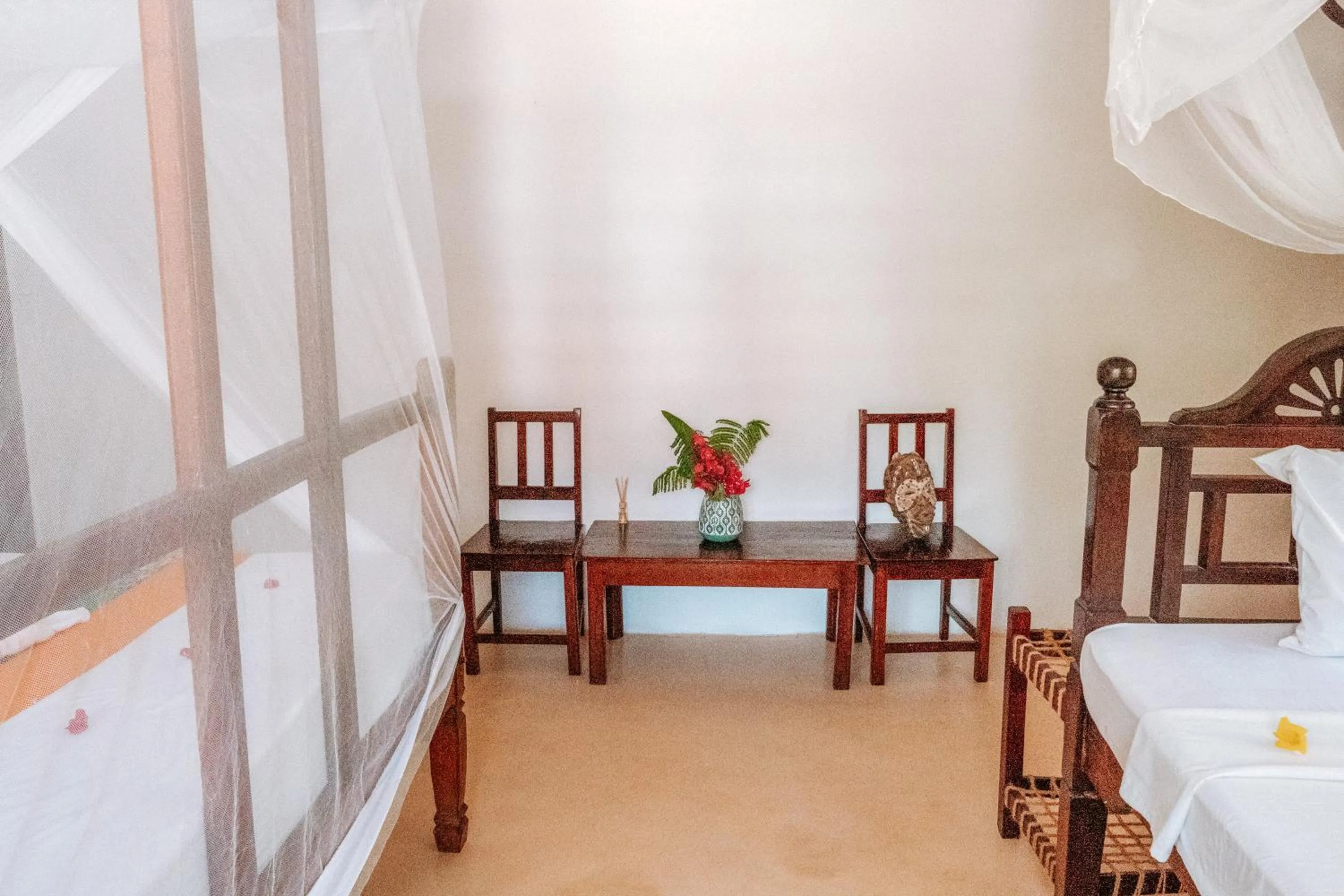 Photo of the whole room, Bed in Zanzibar Gem Beach Bungalows