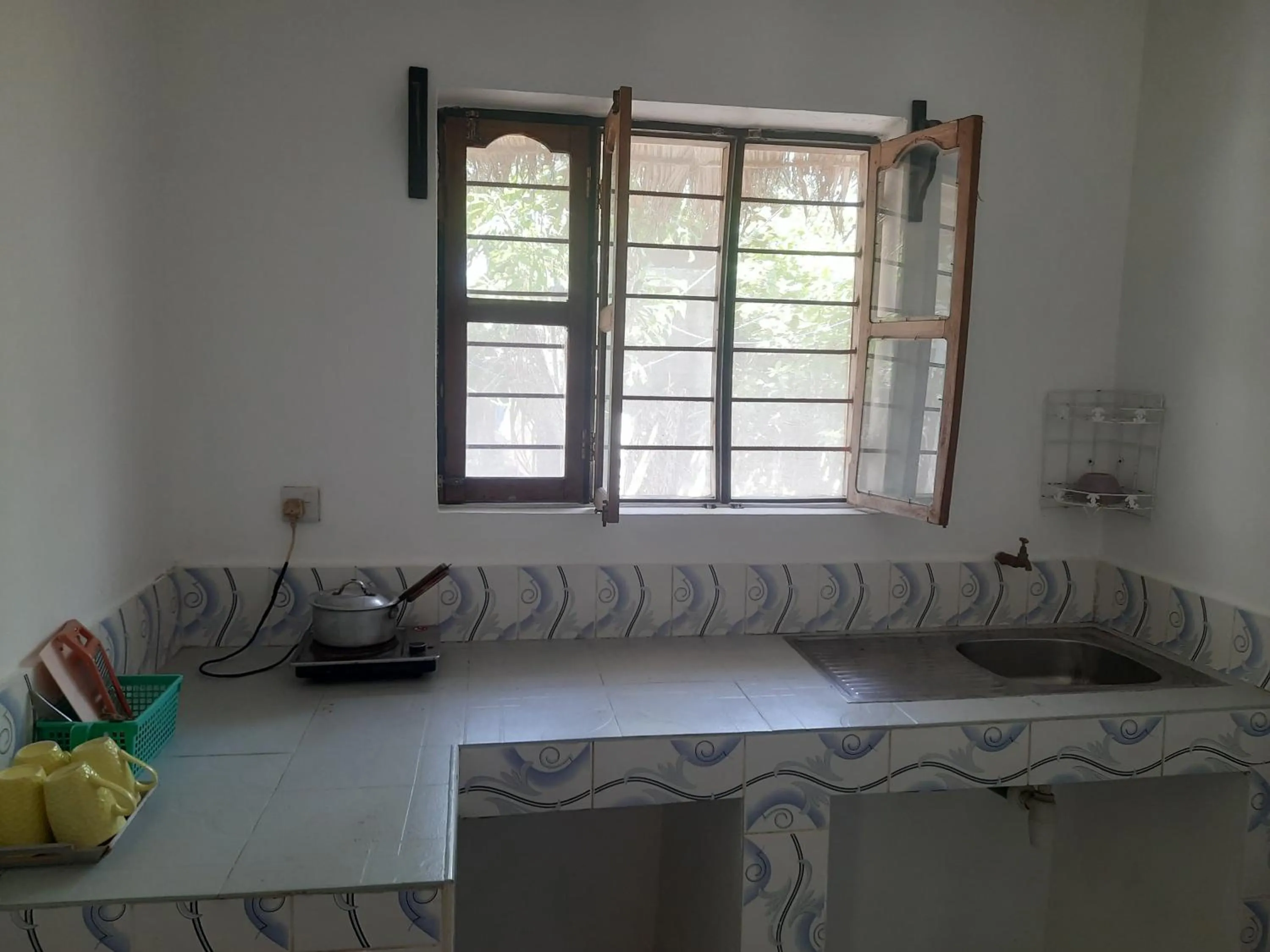Kitchen or kitchenette in Zanzibar Gem Beach Bungalows