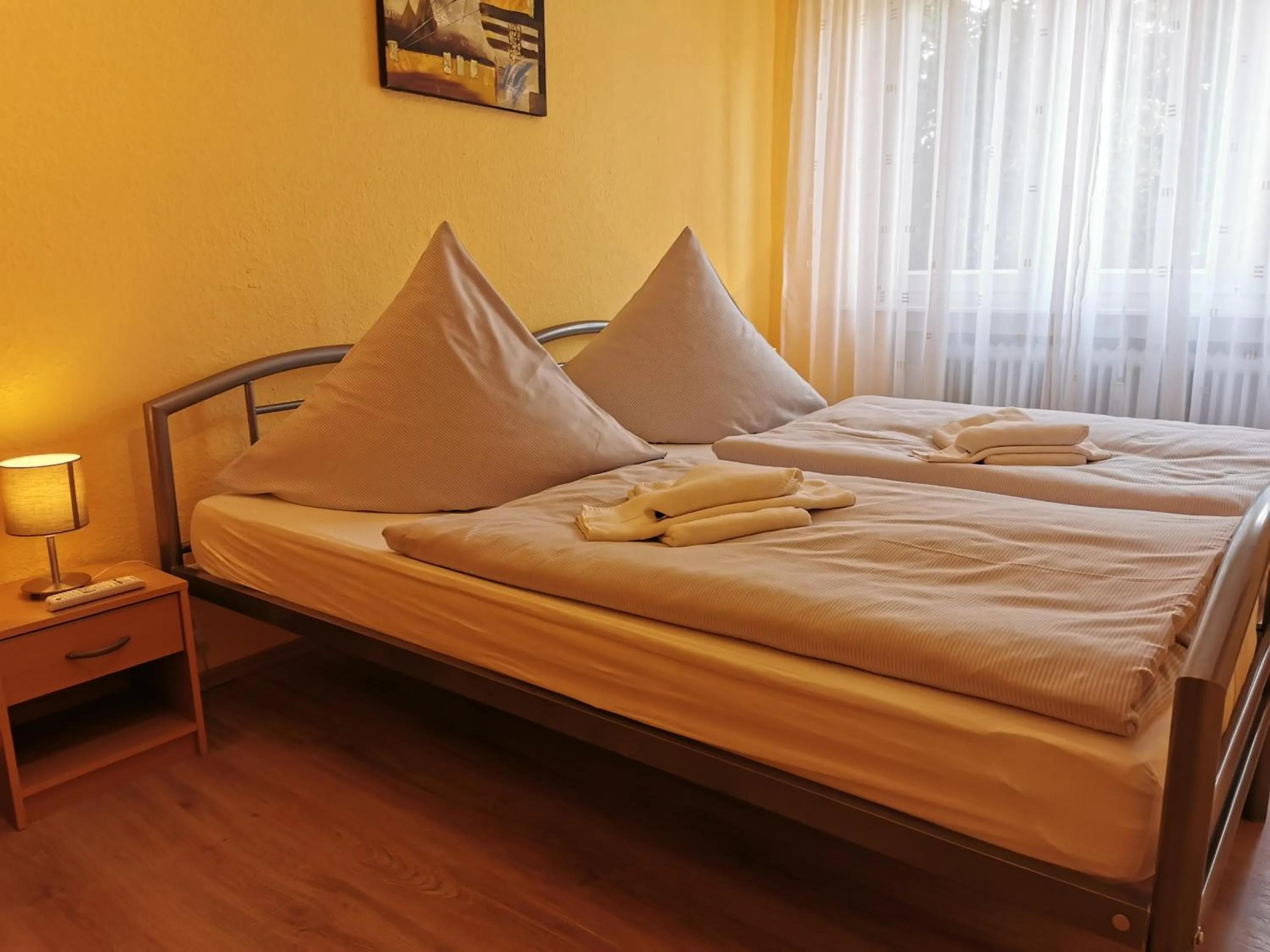 Bed in Hotel Mainperle