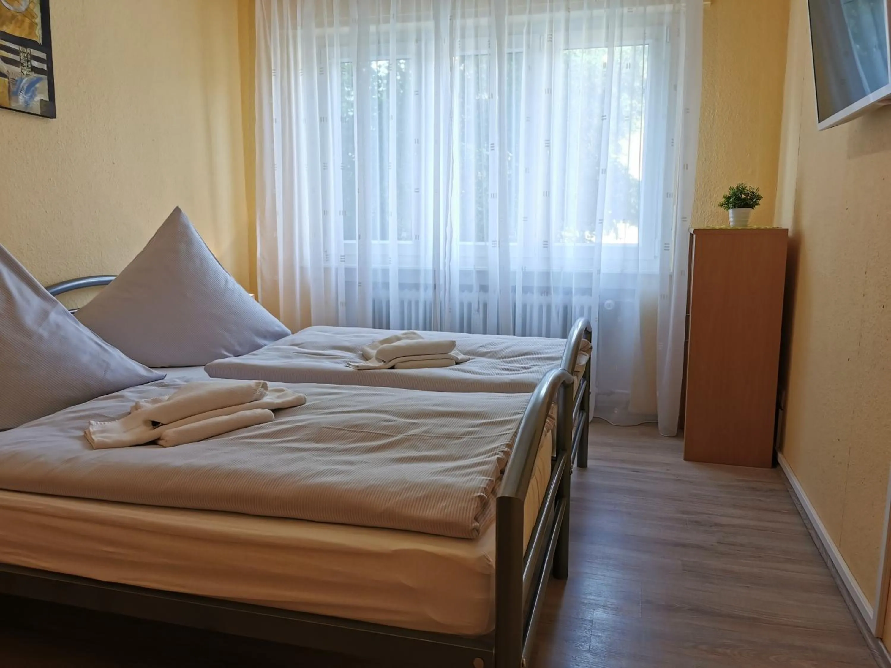 Bed in Hotel Mainperle