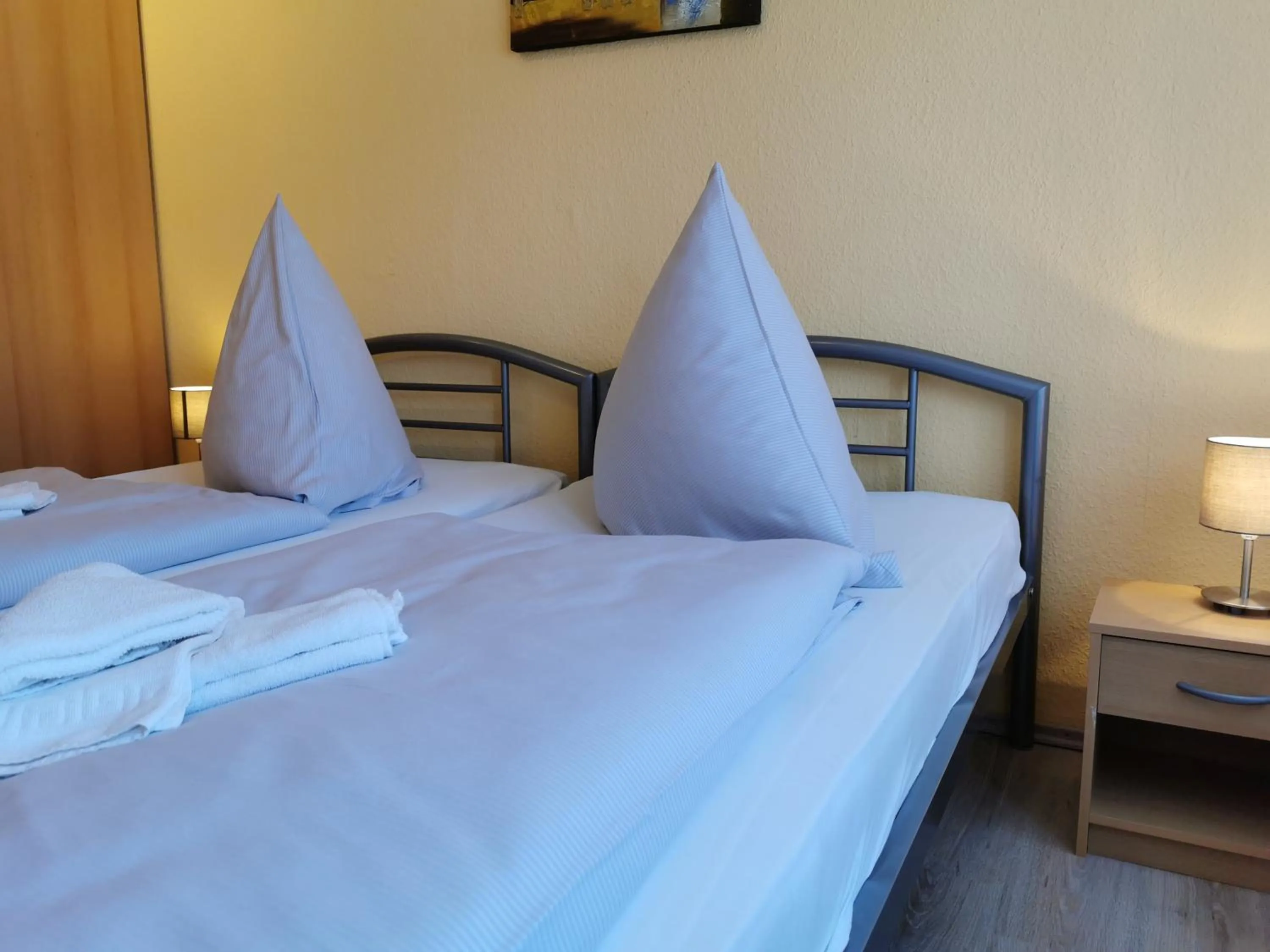 Bed in Hotel Mainperle