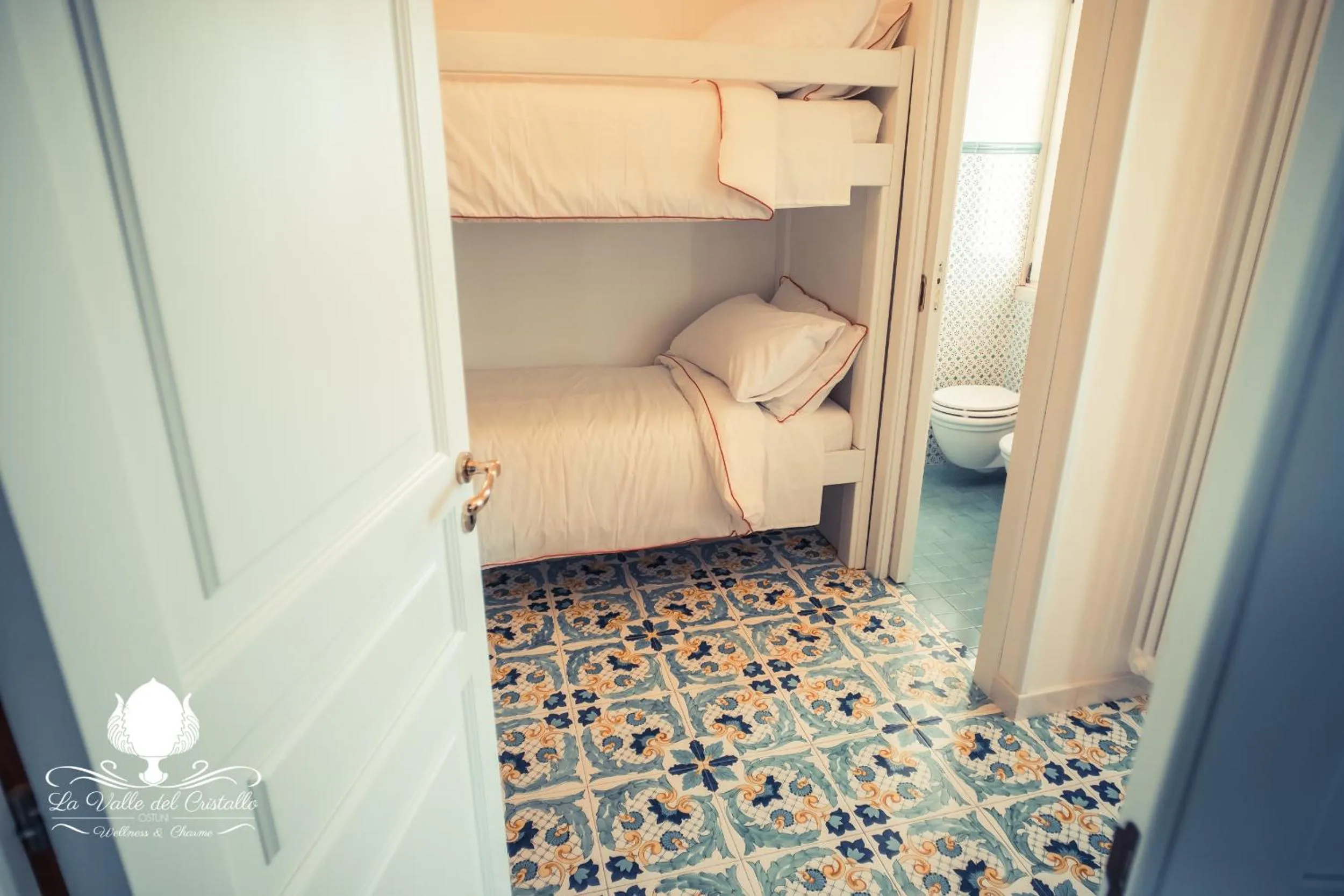 Bed in La Valle Del Cristallo Wellness & Charme