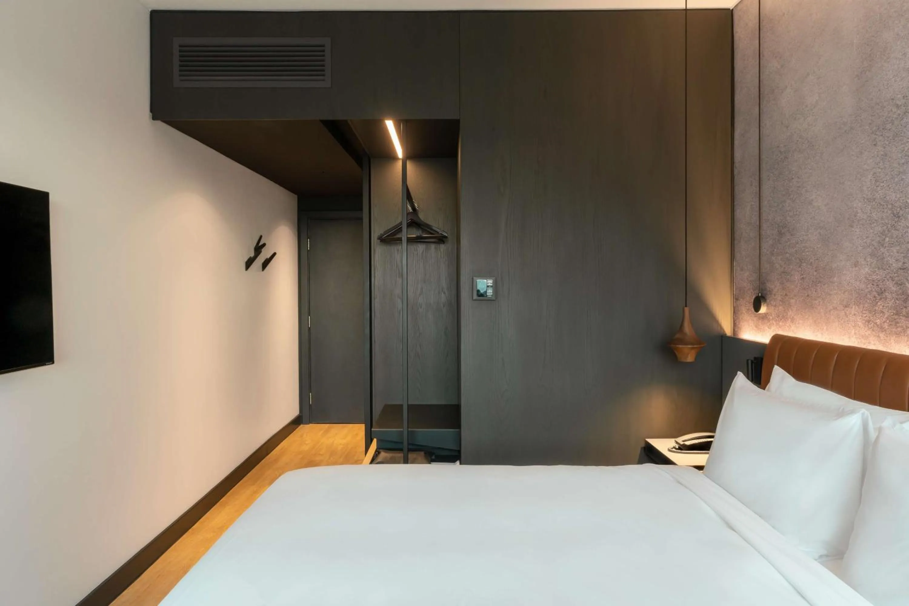 Bed in Radisson RED Hotel Johannesburg Rosebank