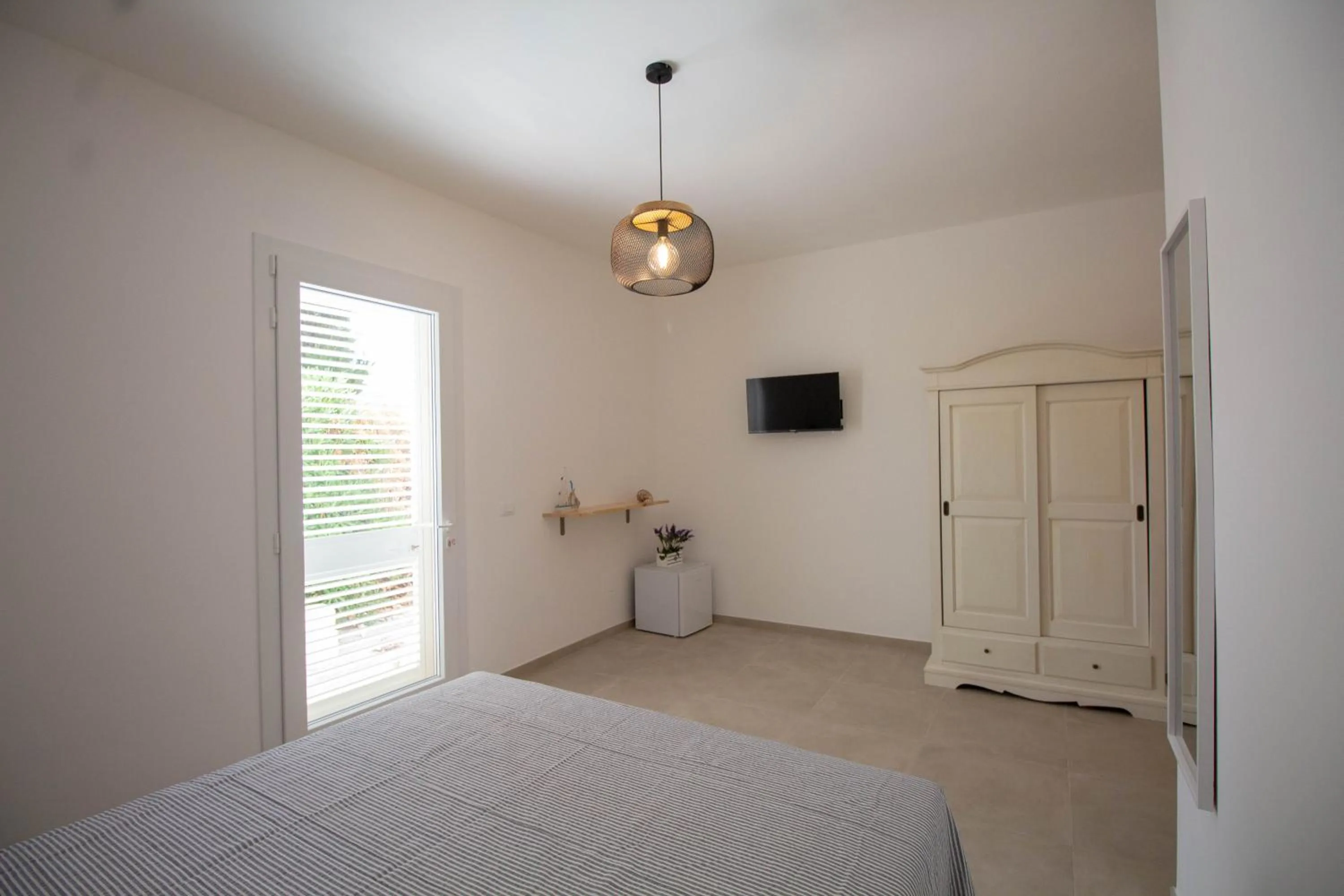 Photo of the whole room in B&B La Penisola