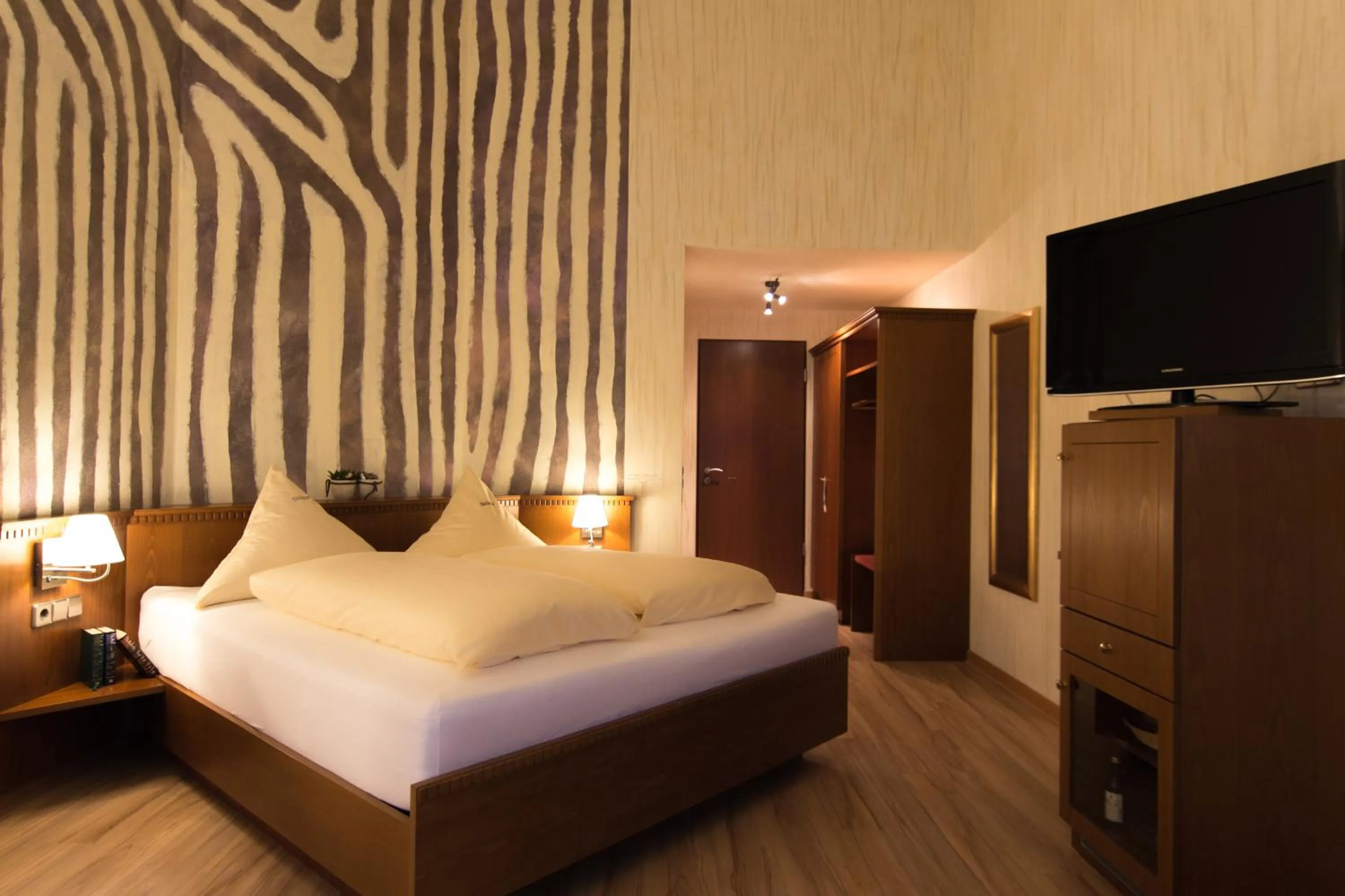 Photo of the whole room, Bed in Wirthshof Hotel & Chalets