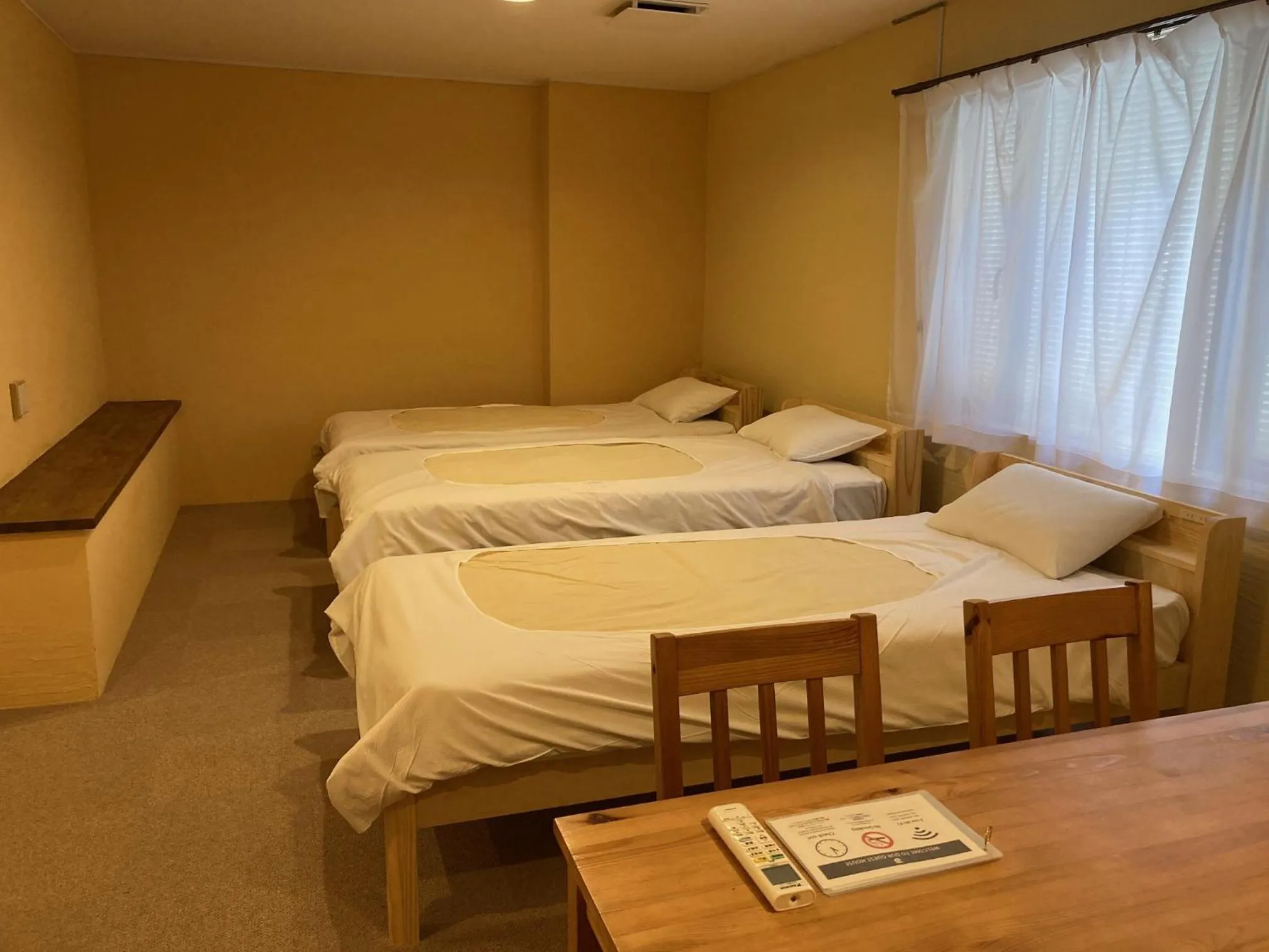 Photo of the whole room, Bed in J-Hoppers Beppu Guesthouse ジェイホッパーズ別府ゲストハウス