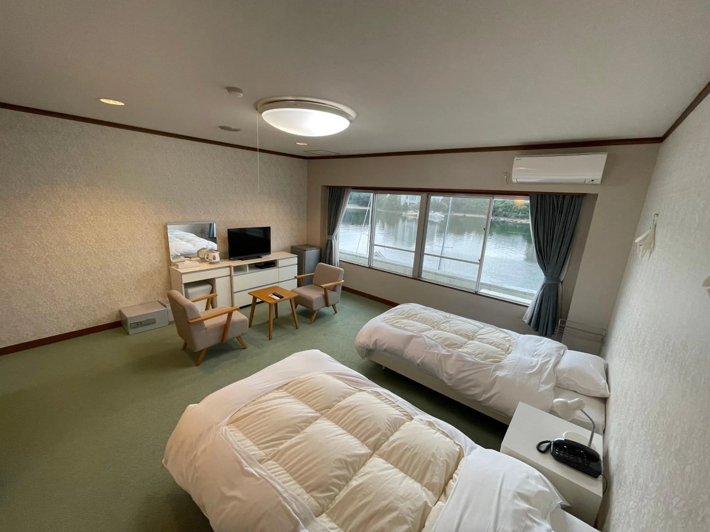 Photo of the whole room, Bed in Marina Hotel Kaikuu