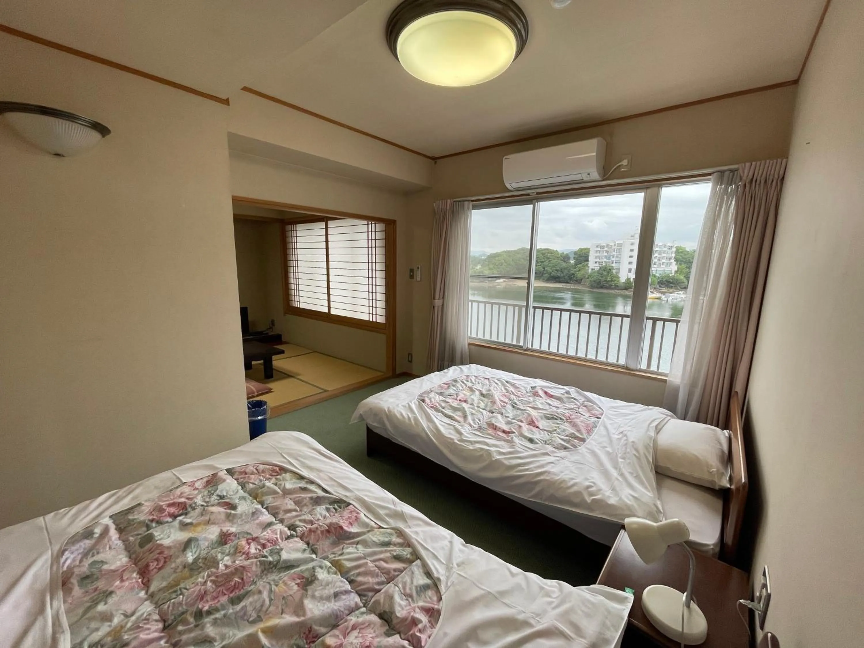 Photo of the whole room, Bed in Marina Hotel Kaikuu