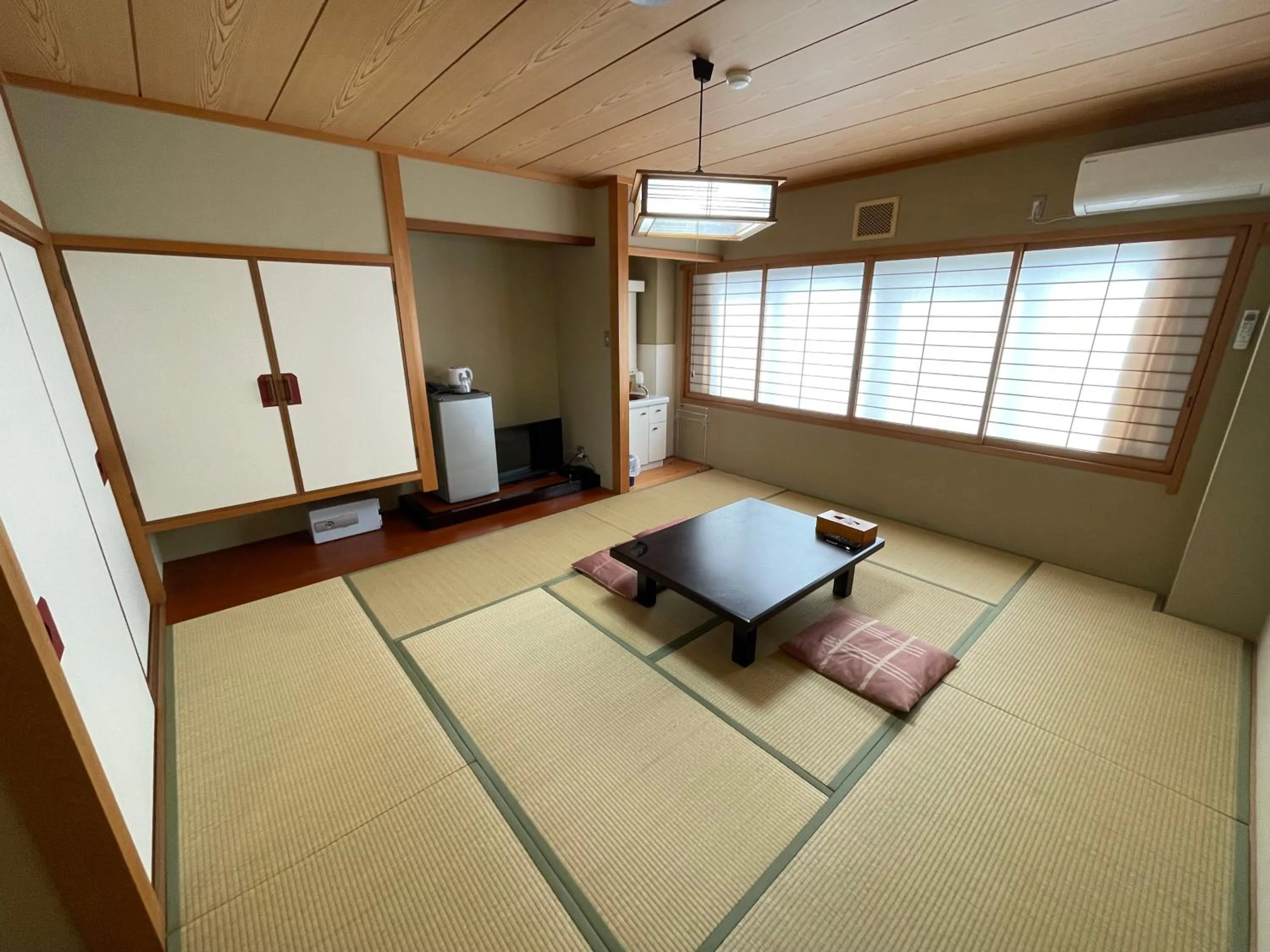 Living room, Bed in Marina Hotel Kaikuu