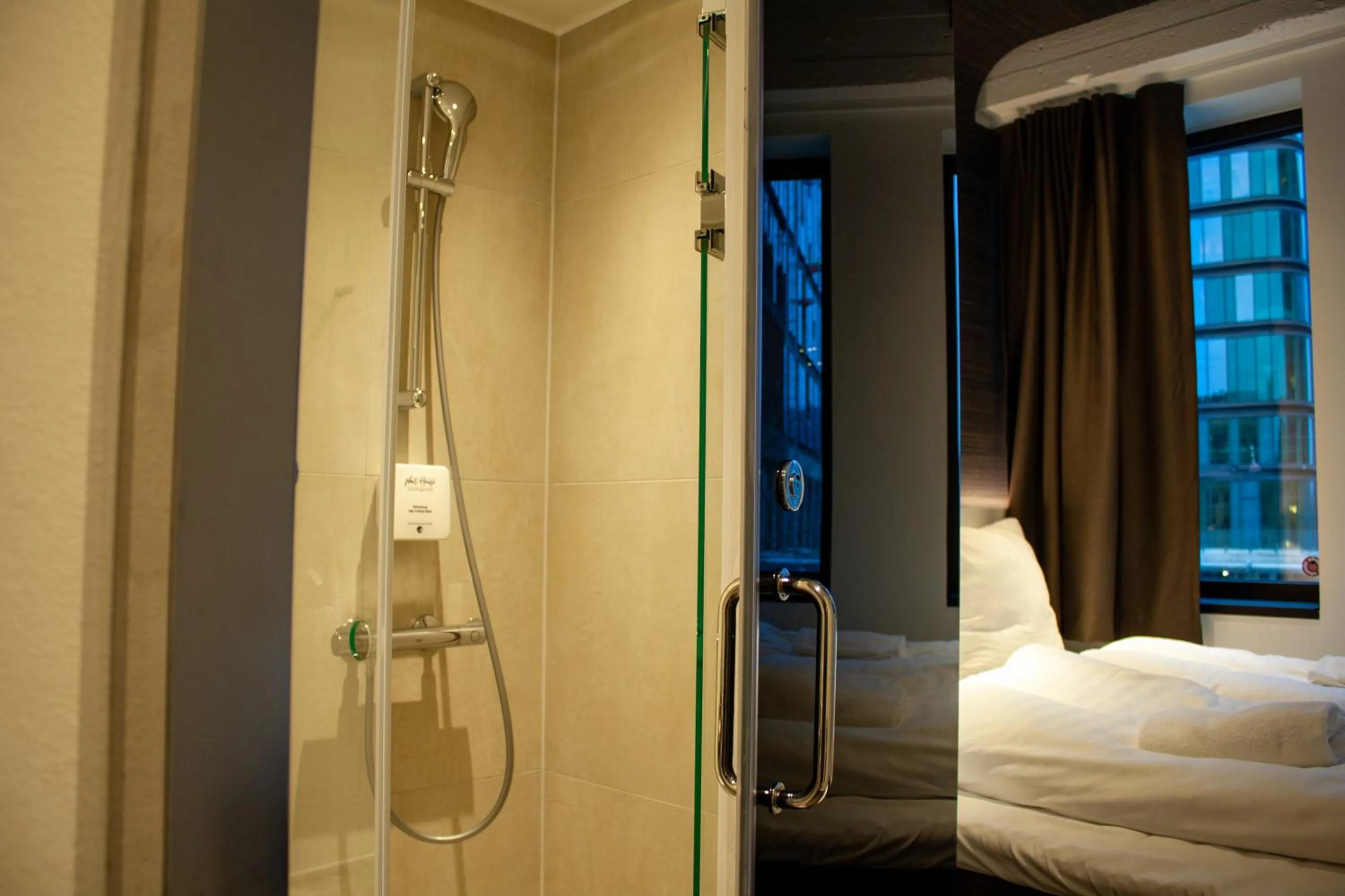 Shower, Bed in Next House Copenhagen