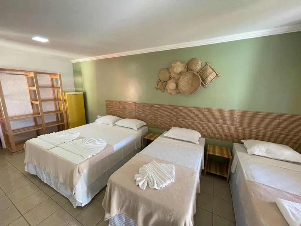 Bed in MUTA PRAIA HOTEL