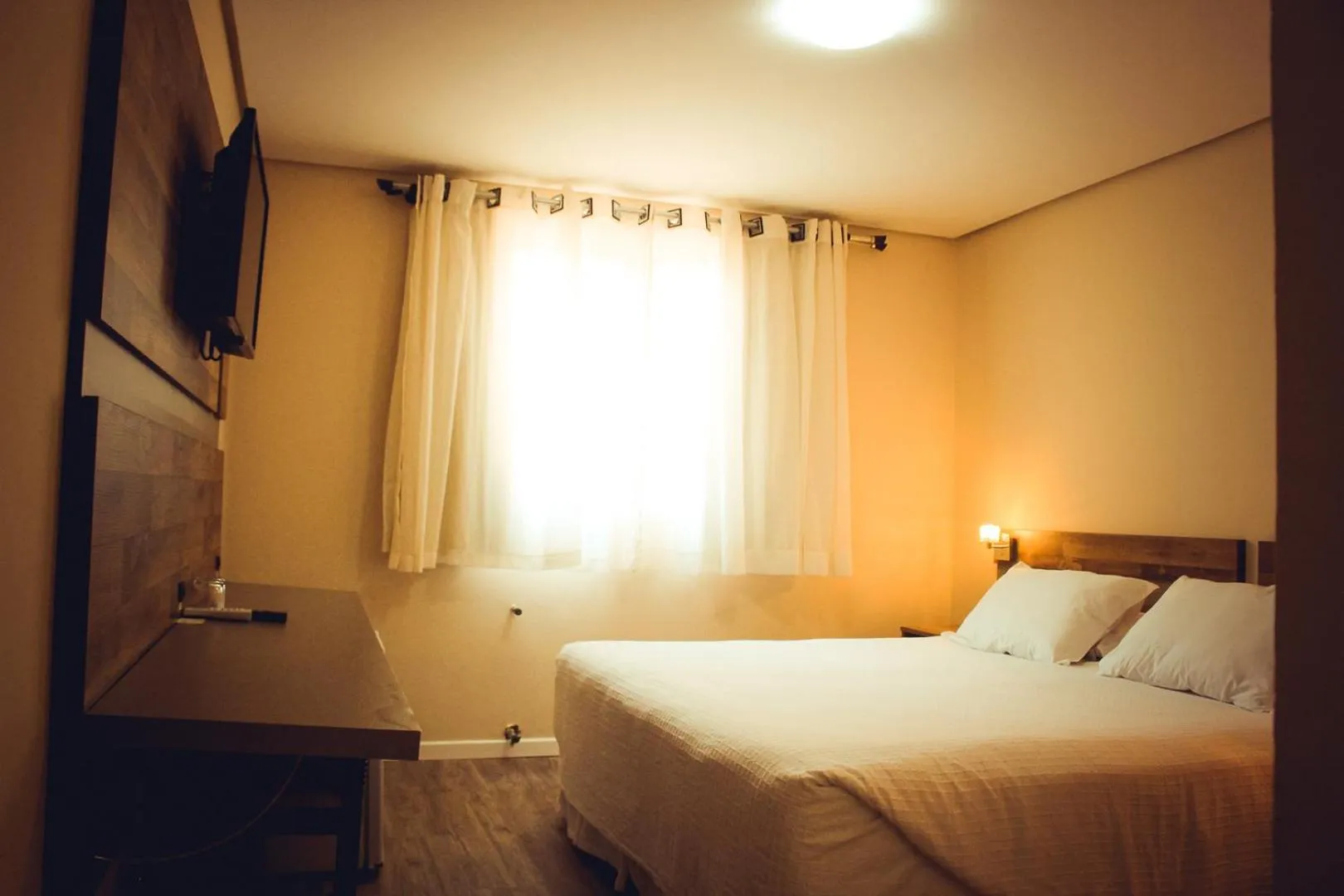 Photo of the whole room, Bed in Hotel Renascença