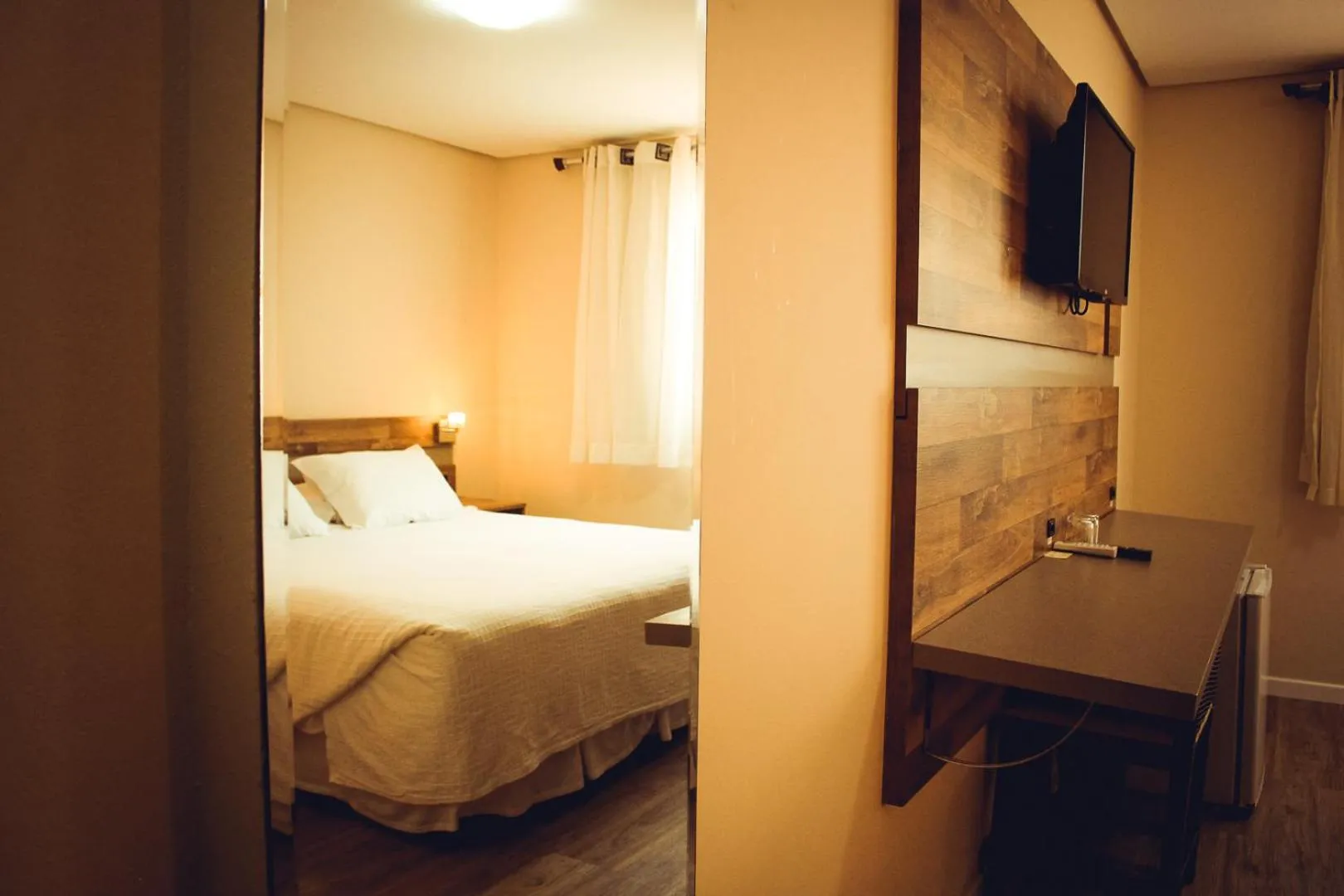 Photo of the whole room, Bed in Hotel Renascença