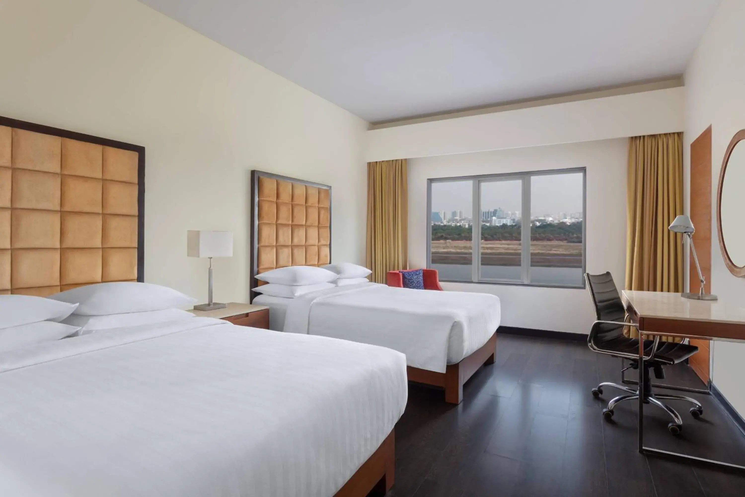 Deluxe Guest room, 2 Queen, River view in Surat Marriott Hotel Deluxe Guest room, 2 Queen, River view in Surat Marriott Hotel
