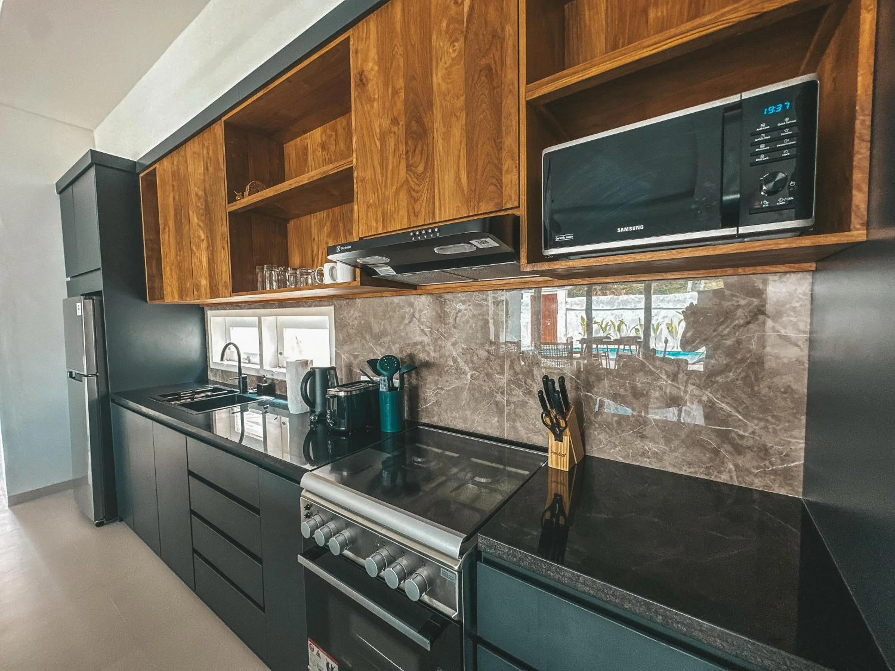 Kitchen or kitchenette in Tropik Resort Lombok