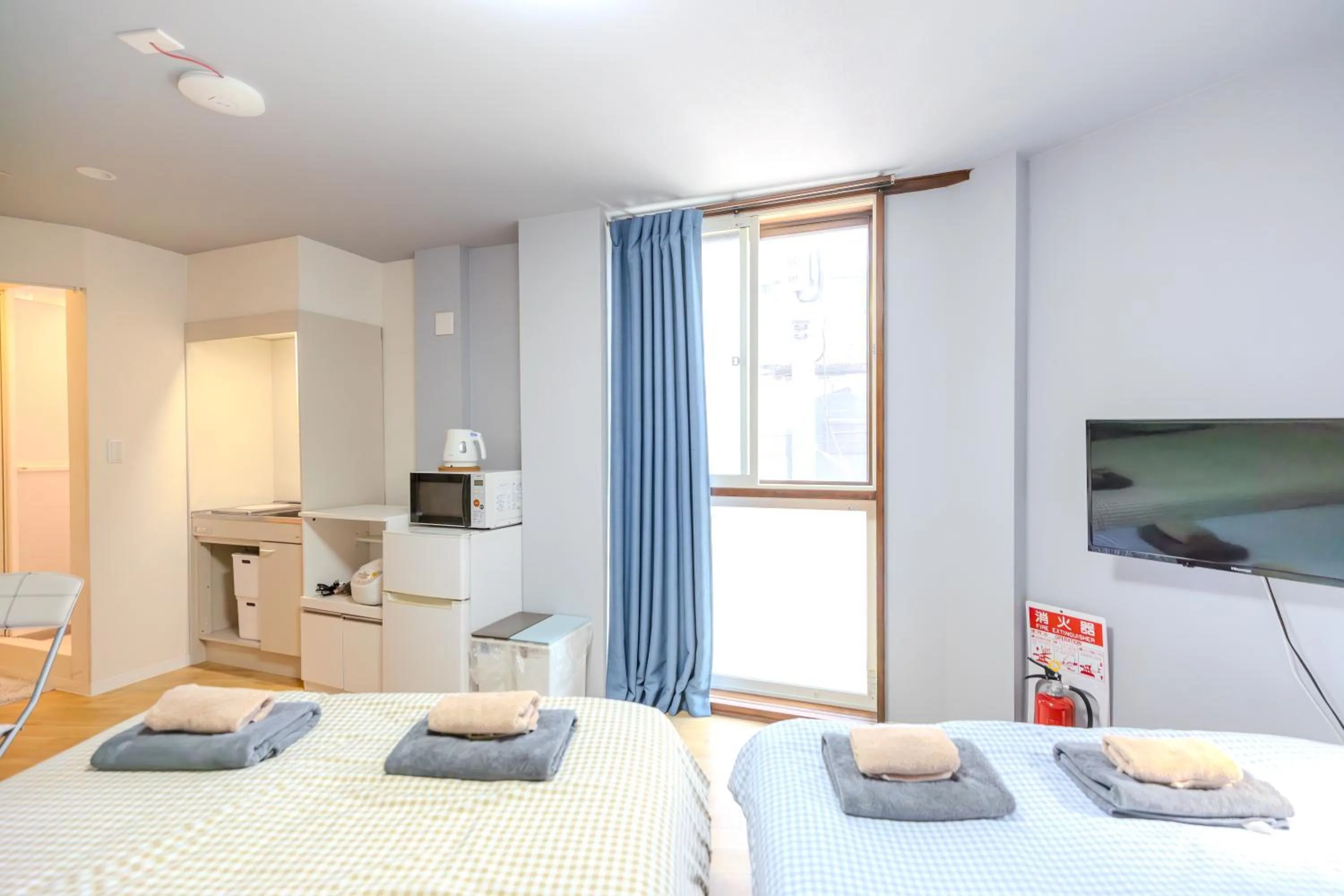 Bed in 武蔵Musashi Hotel