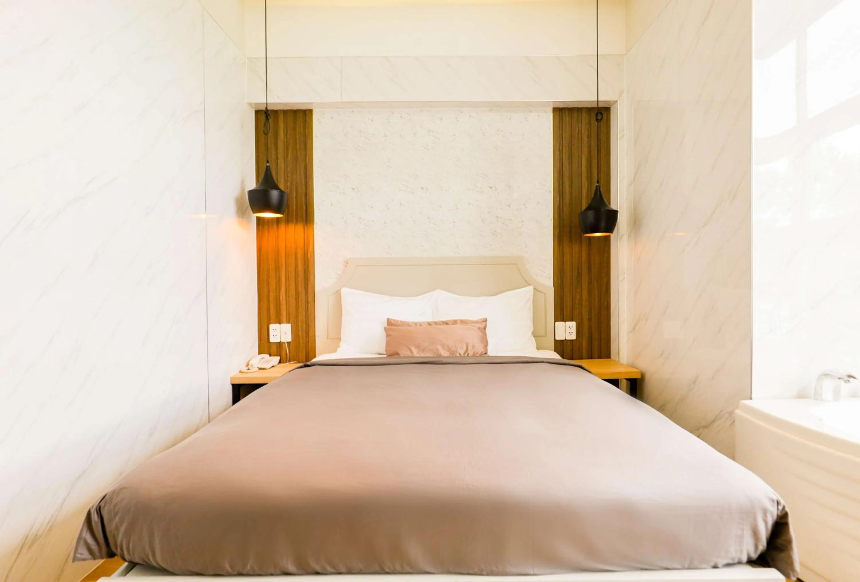 Bed in Lá Hotel Q10