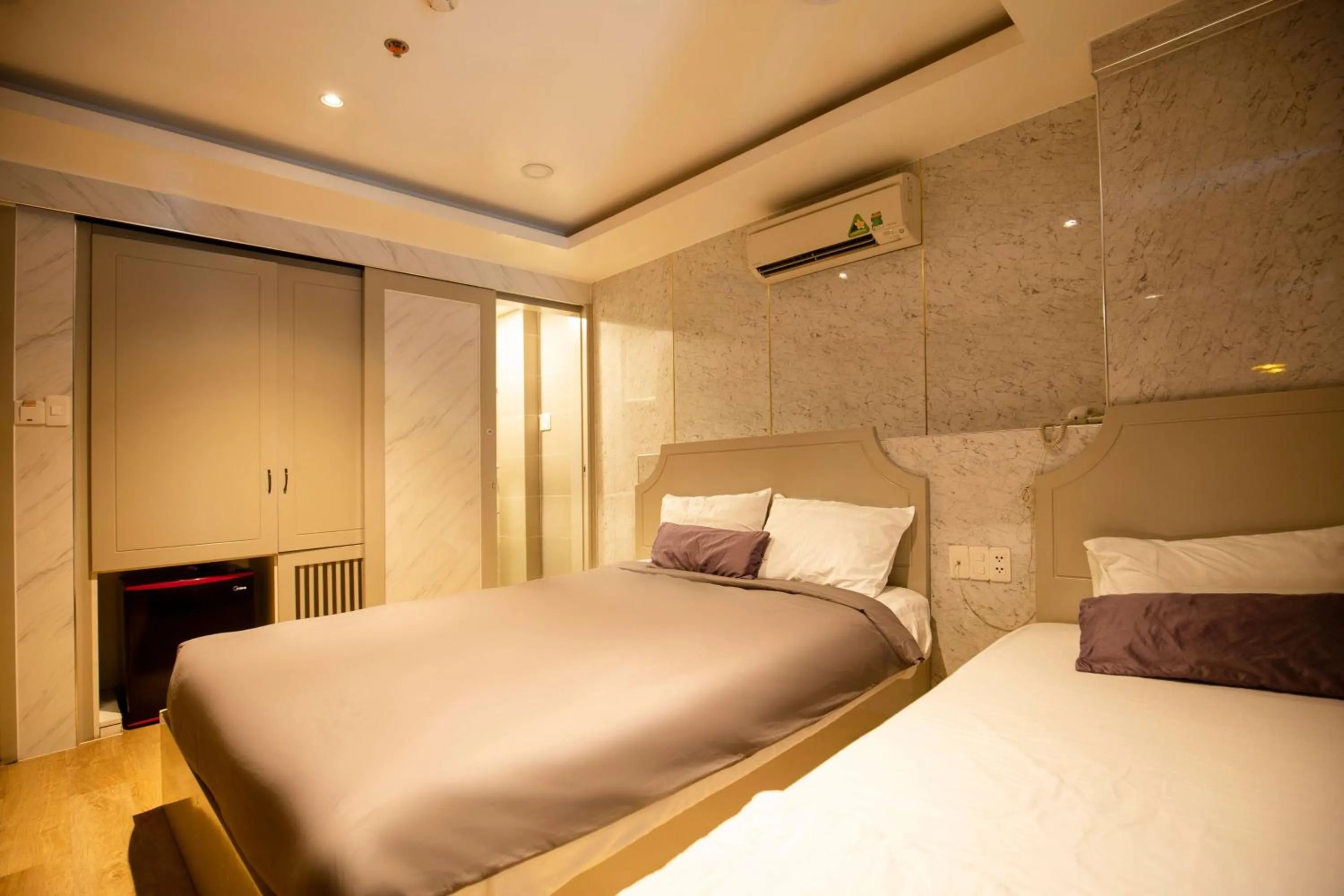 Bed in Lá Hotel Q10