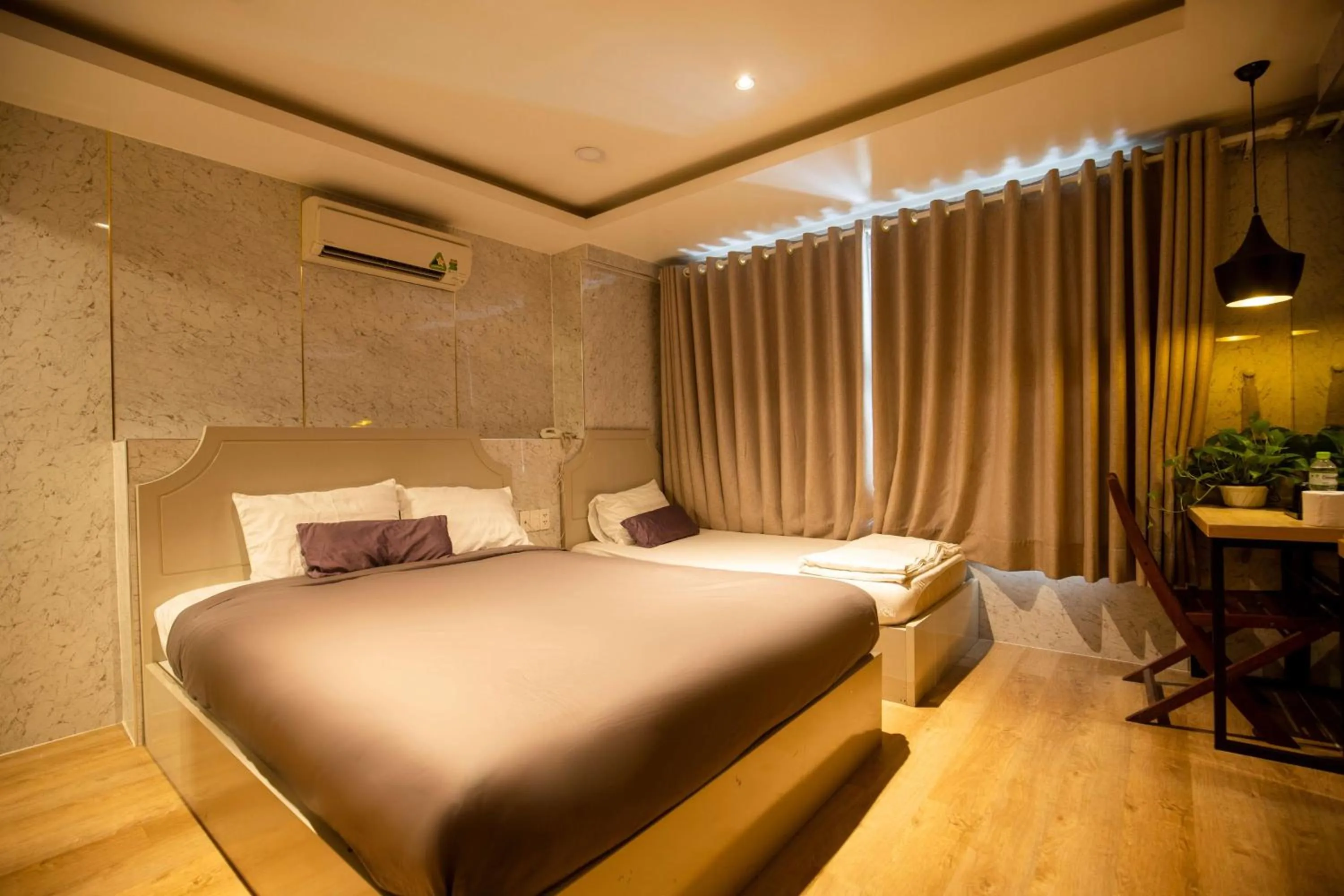 Bed in Lá Hotel Q10