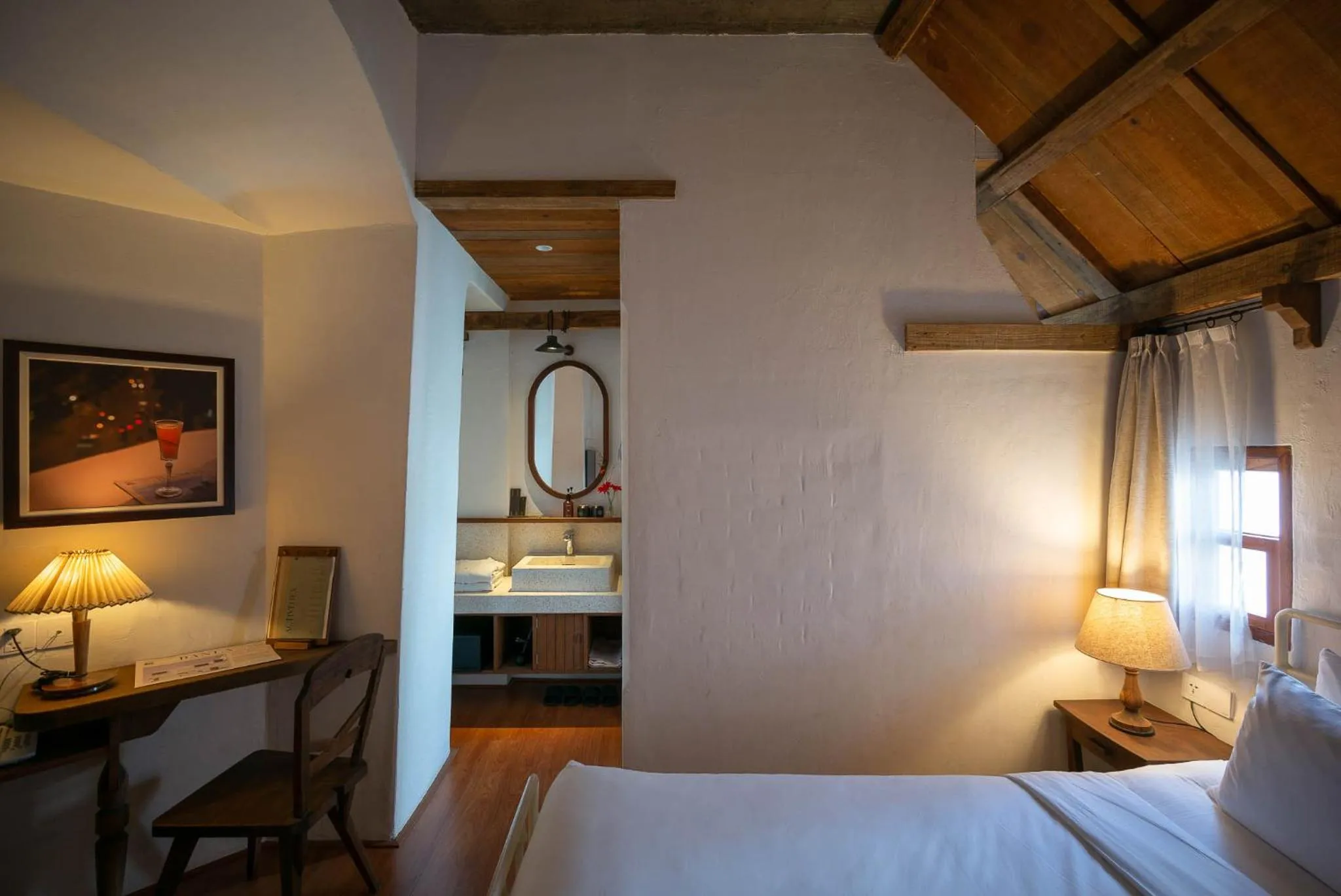 Seating area, Bed in Banla Boutique Hotel