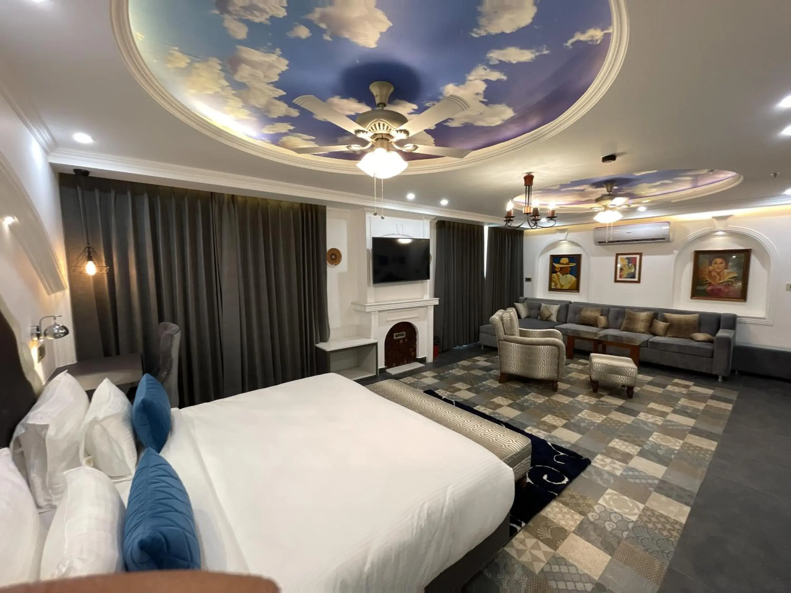 Living room, Bed in Sterling Marbella Dehradun Living room, Bed in Sterling Marbella Dehradun