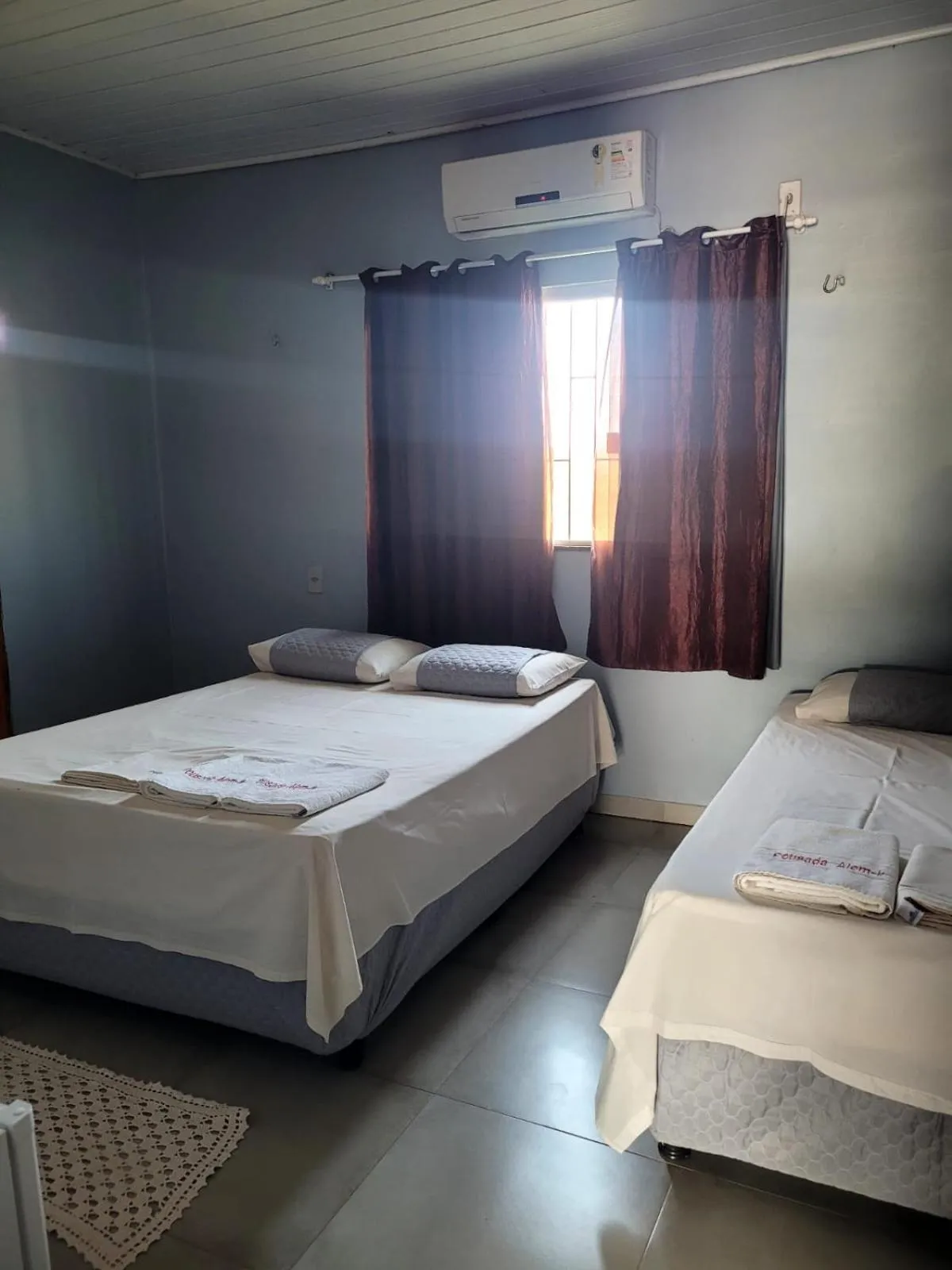 Bed in POUSADA ALÉM-K