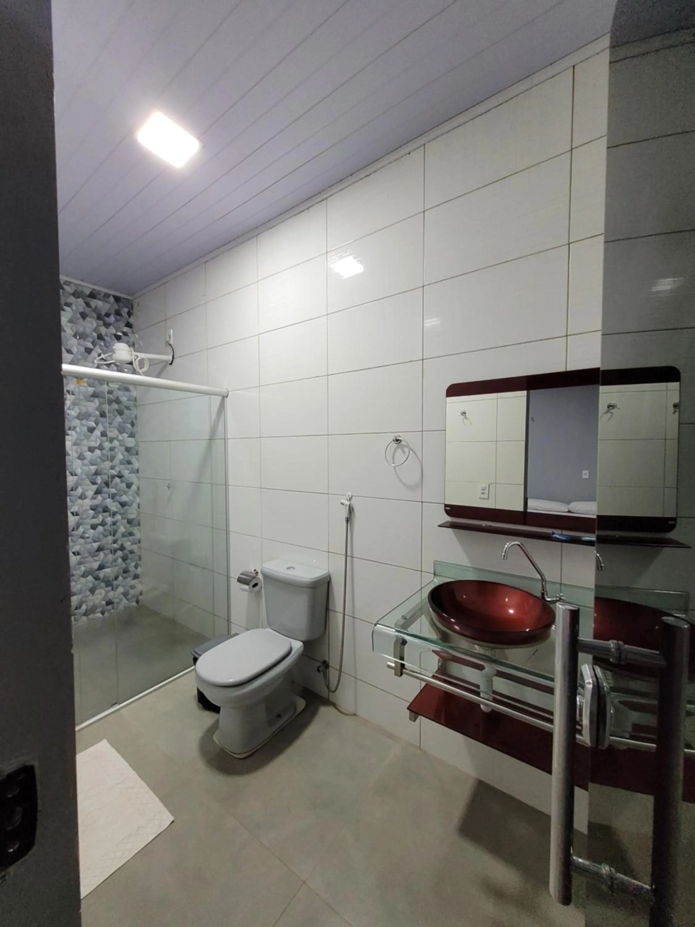 Bathroom in POUSADA ALÉM-K