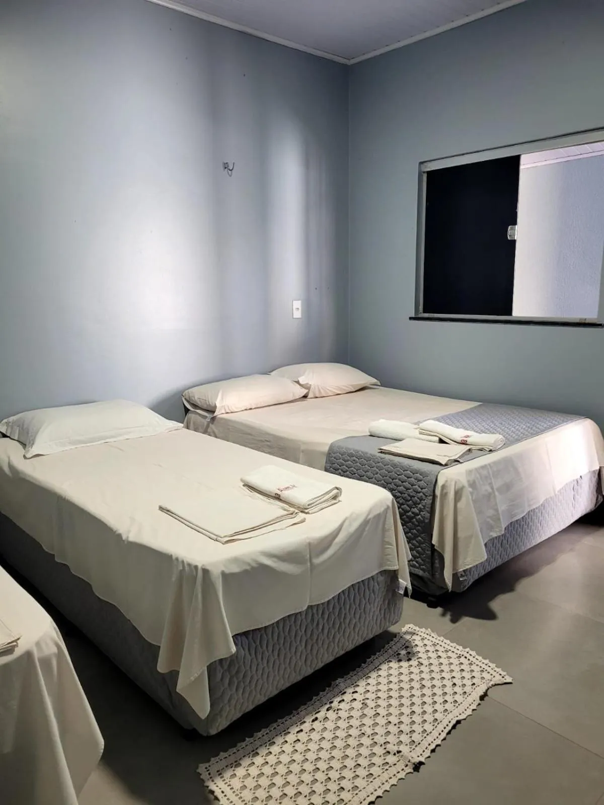 Bed in POUSADA ALÉM-K