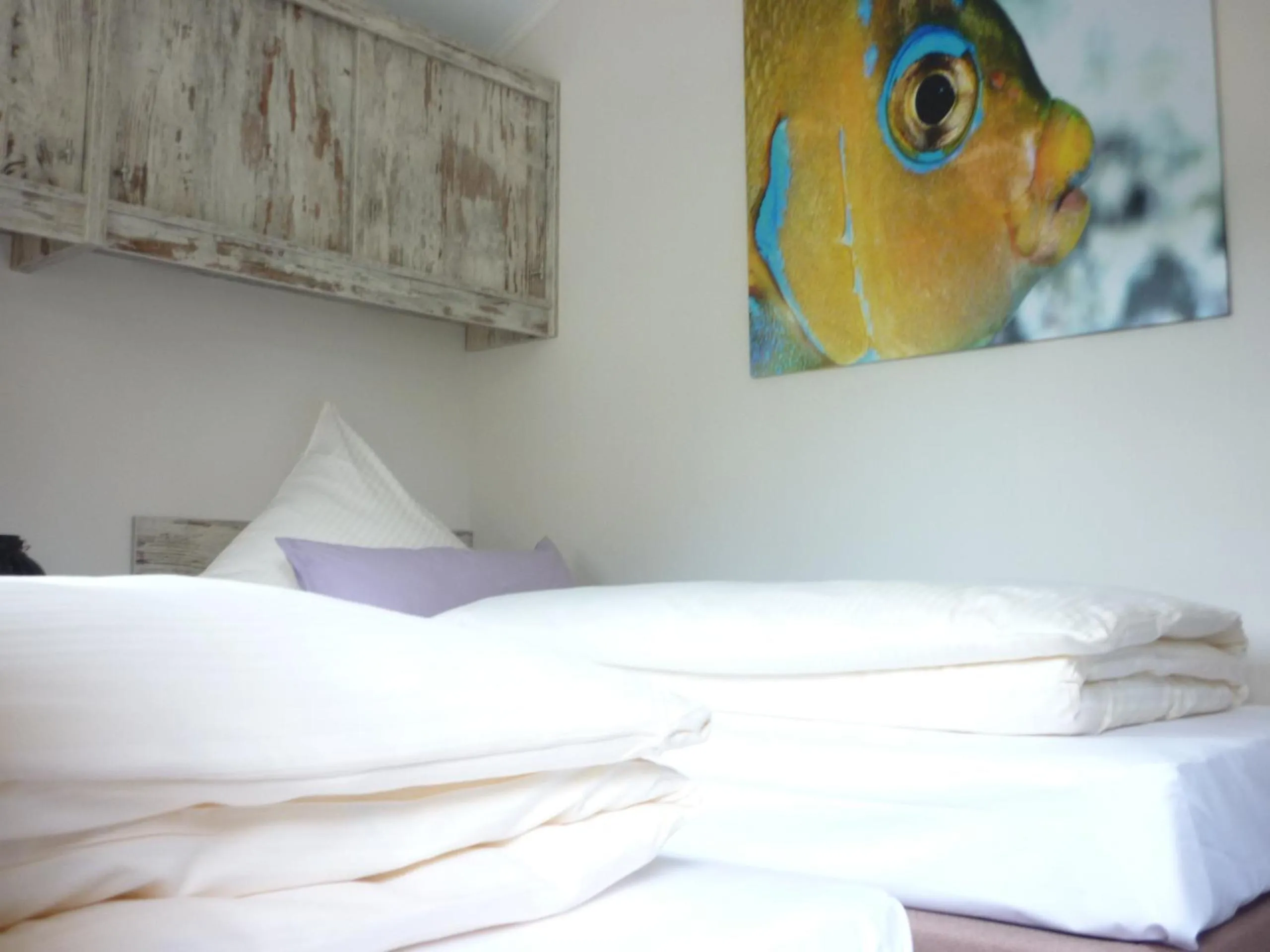 Bed in zu Jeddelohs Lodge Hotel