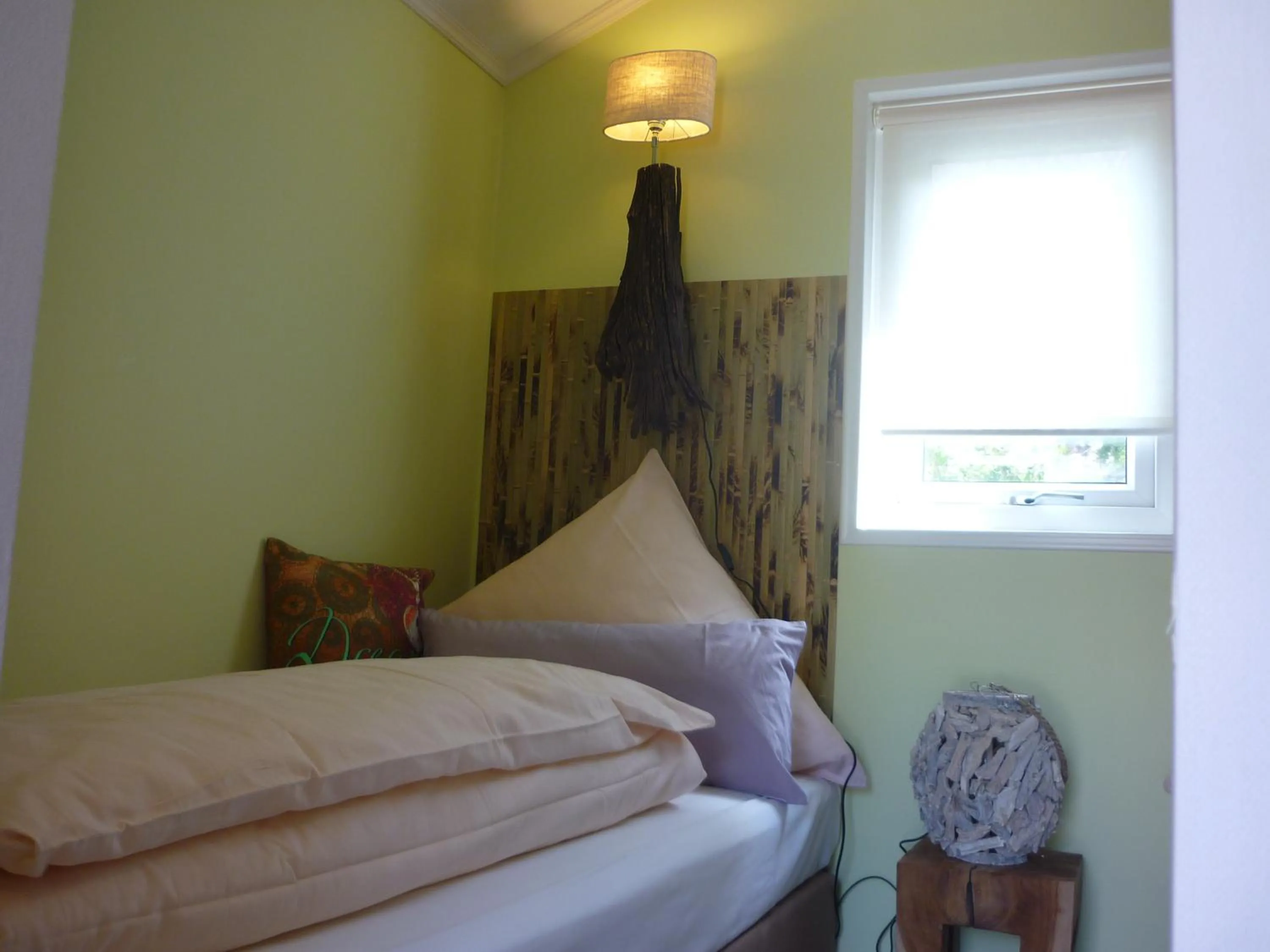 Bed in zu Jeddelohs Lodge Hotel