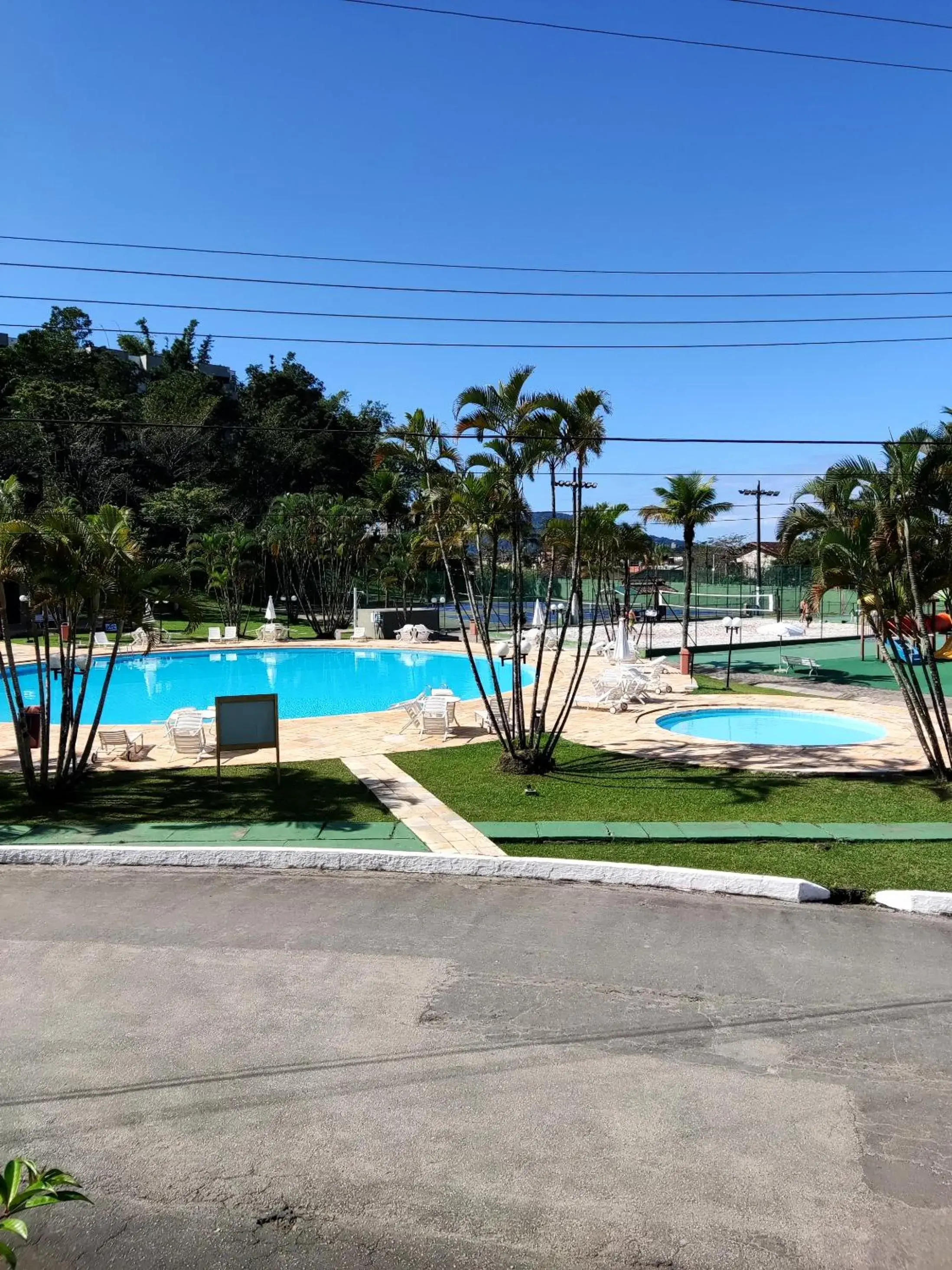 Three-Bedroom House in Apartamento até 10 pessoas na enseada Guarujá em condomínio clube praia piscinas salão jogos quadra futebol campo parquinho brinquedos Wi-fi Home office Three-Bedroom House in Apartamento até 10 pessoas na enseada Guarujá em condomínio clube praia piscinas salão jogos quadra futebol campo parquinho brinquedos Wi-fi Home office