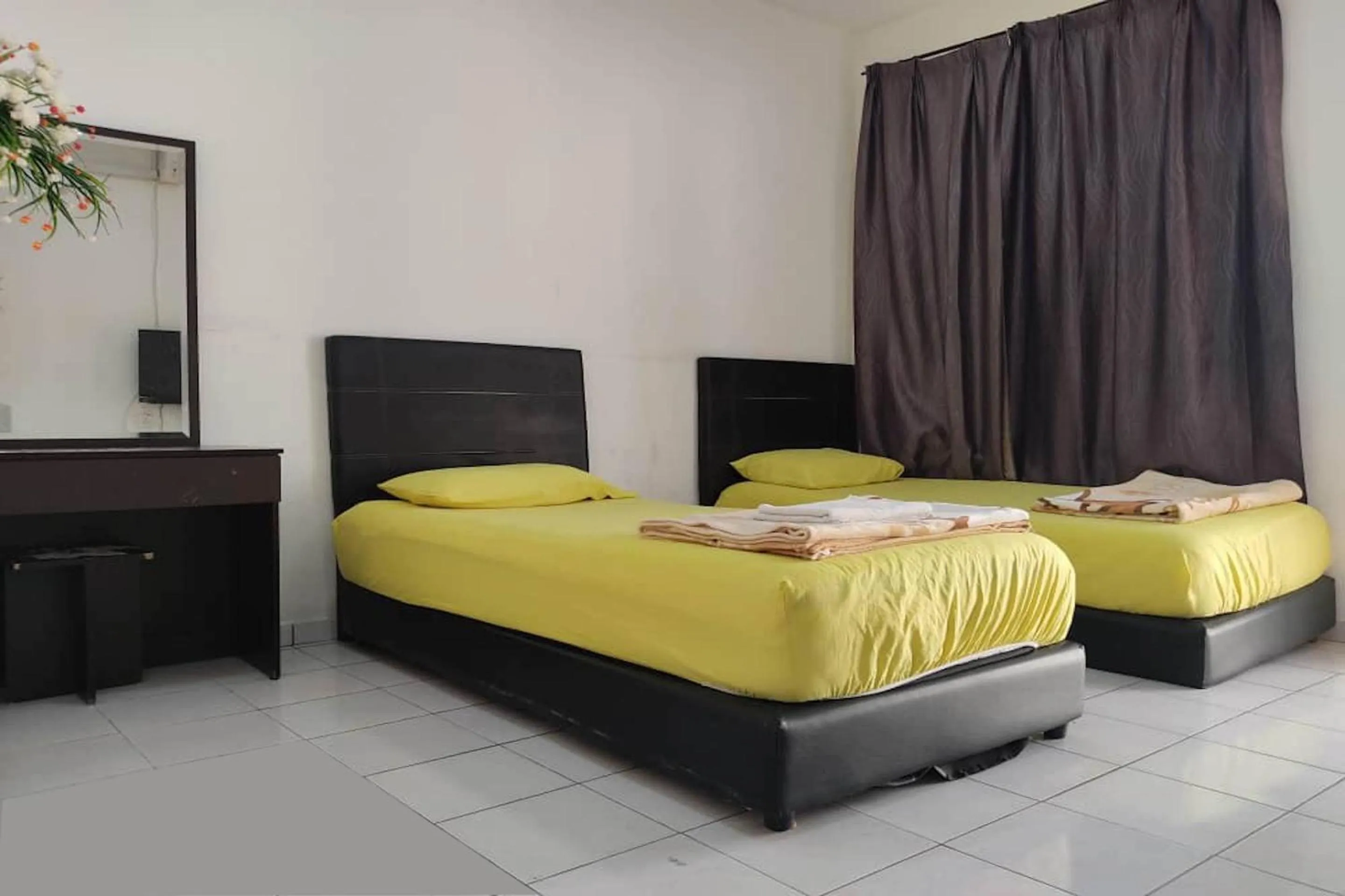 Bedroom, Bed in Hotel O Taman Kota Homestay