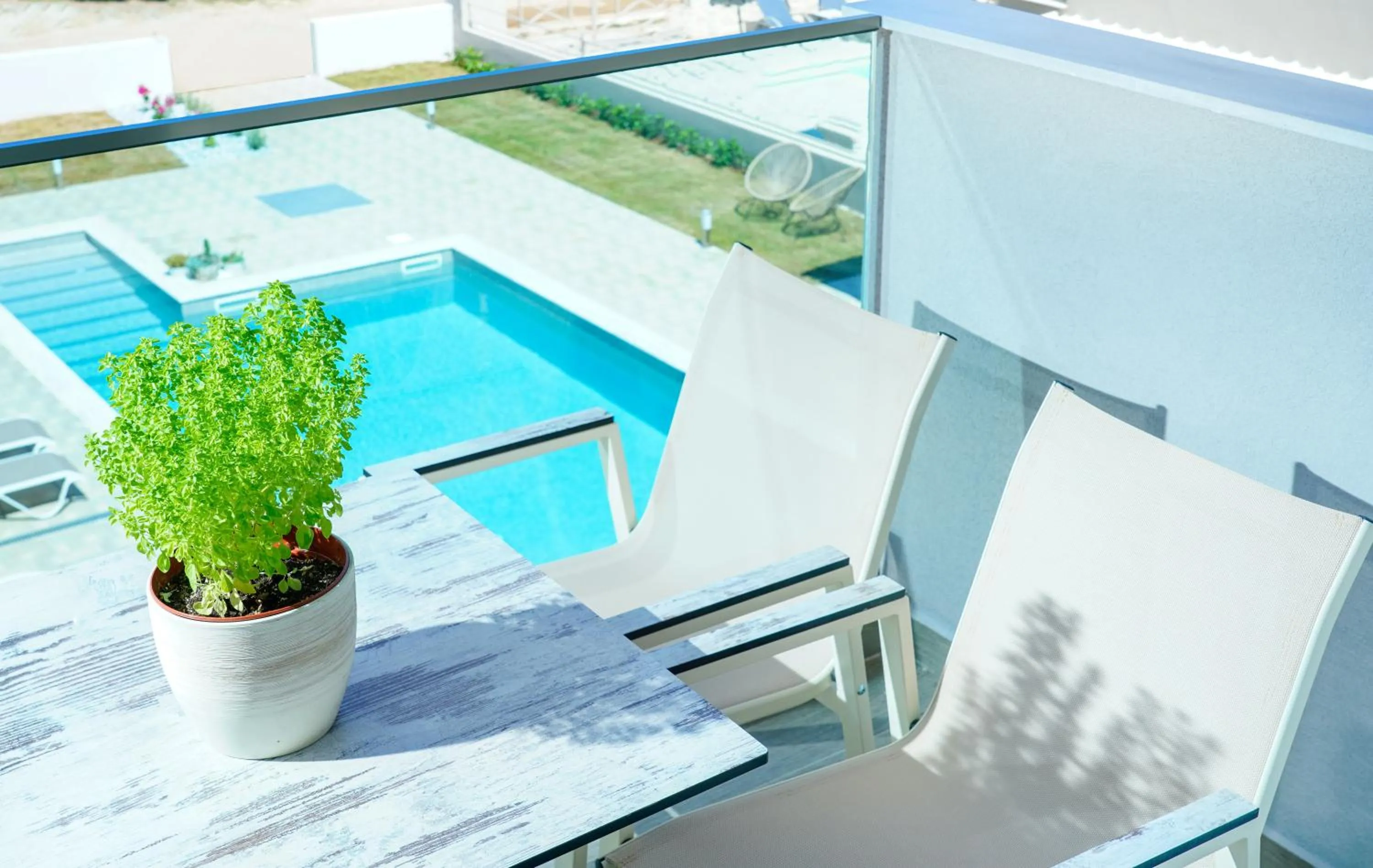Pool view in Aquamarine Luxury Rooms Thassos