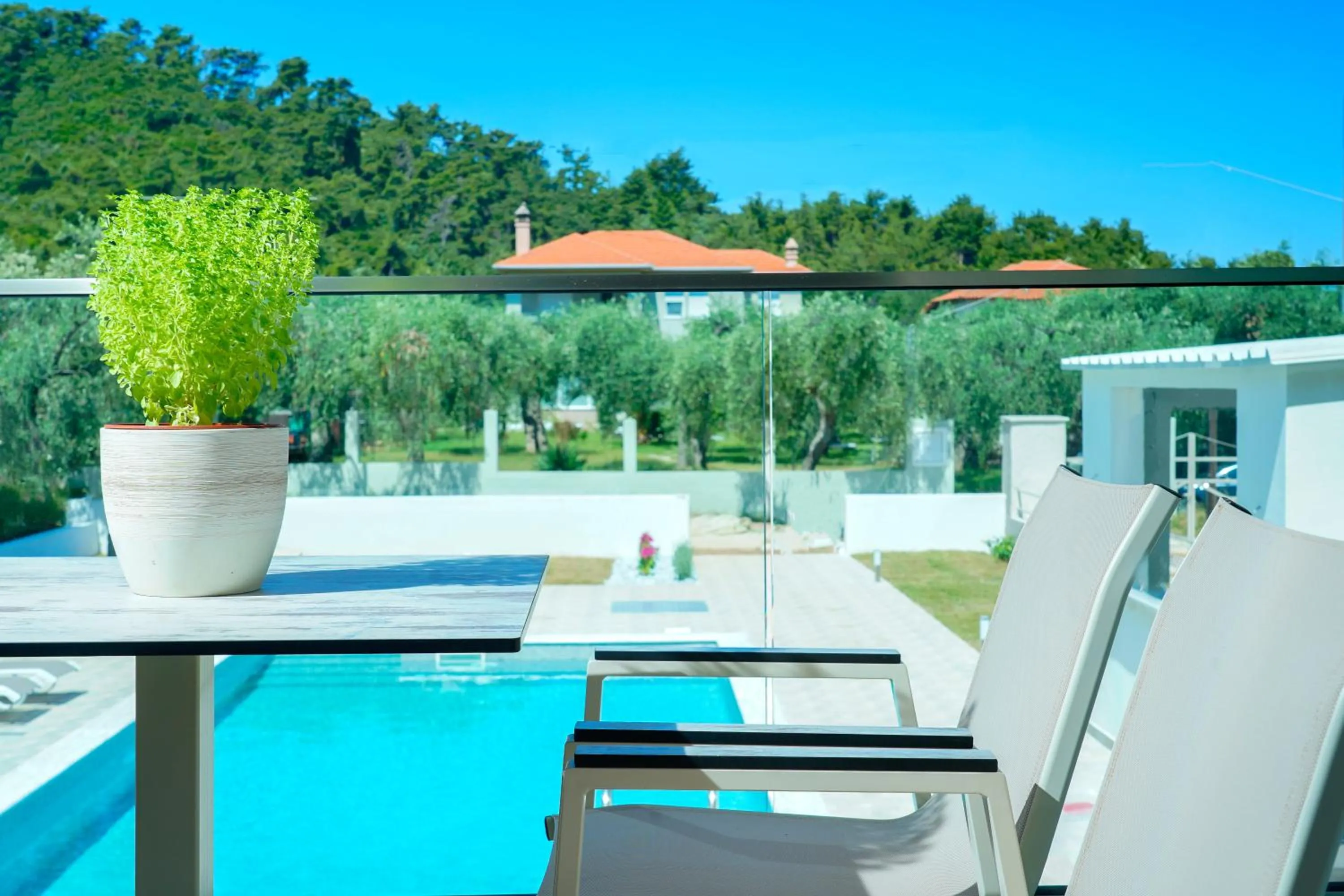 Pool view in Aquamarine Luxury Rooms Thassos