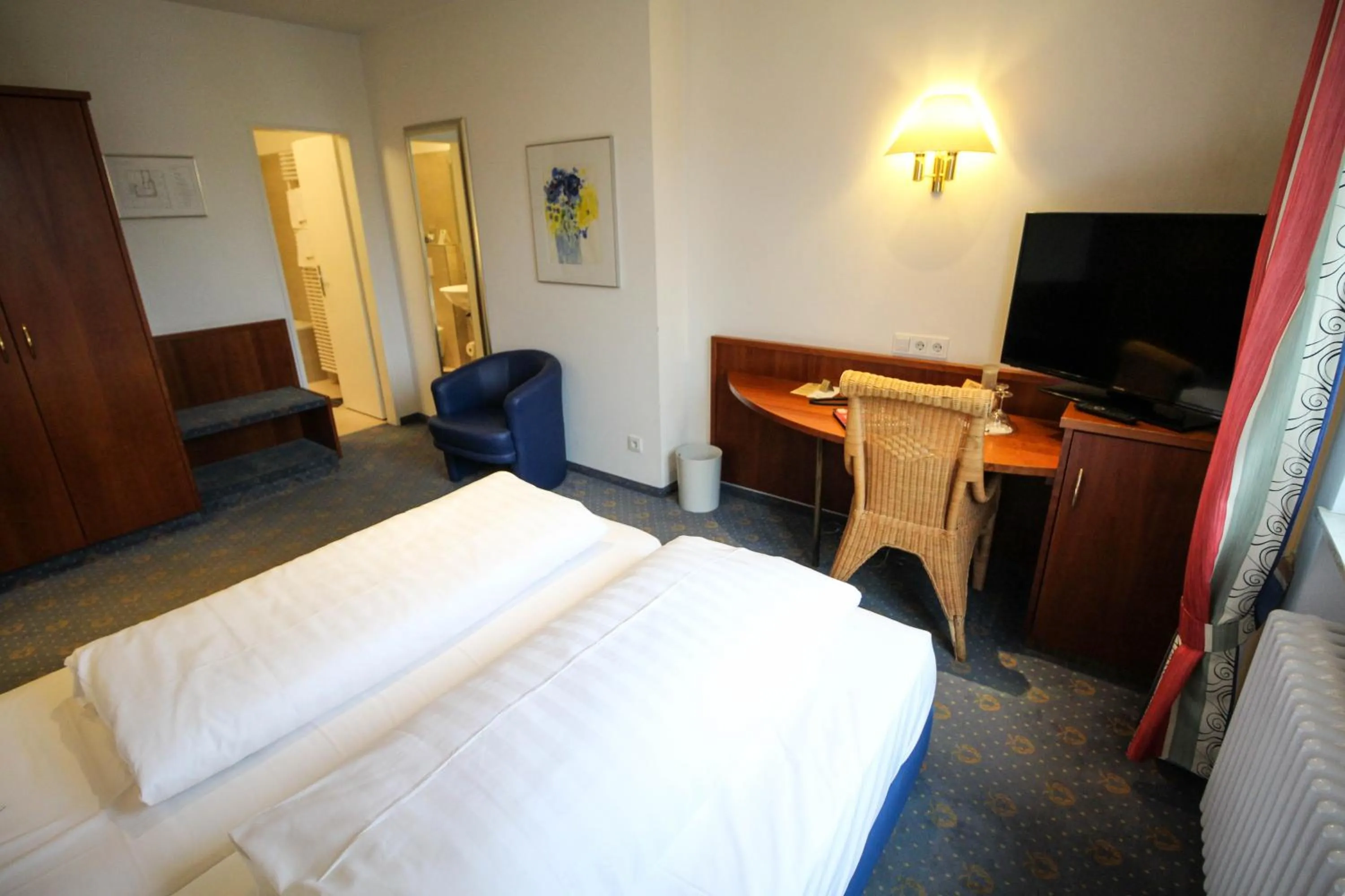 Bed in Ringhotel Zum Goldenen Ochsen