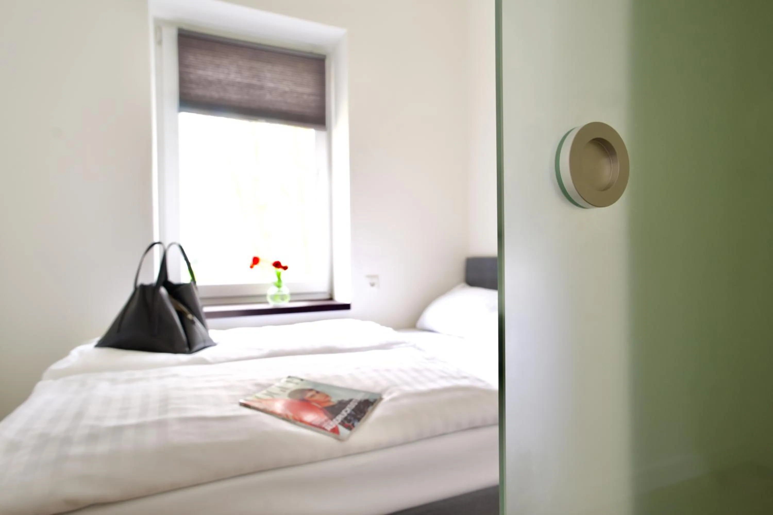 Bed in Apartments Les Jardins