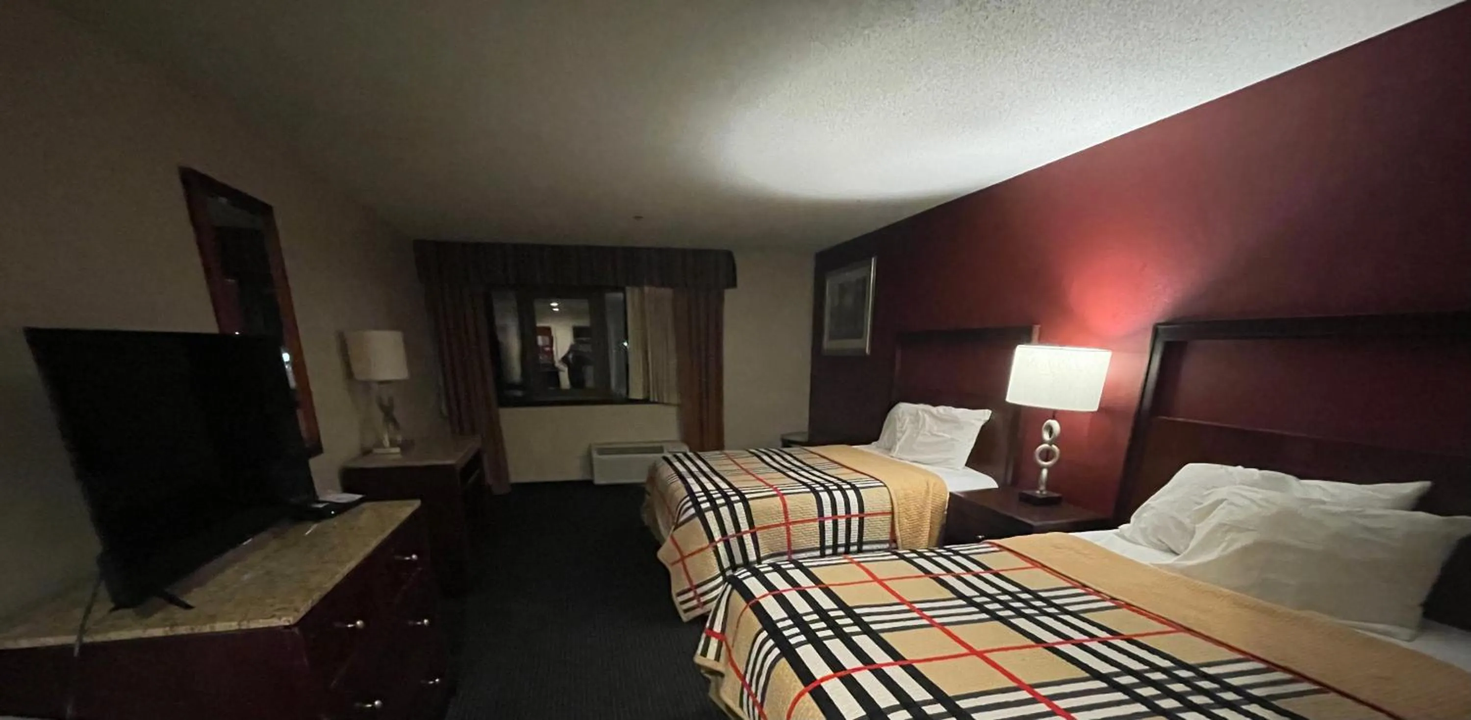 Bed in Apm Inn & Suites