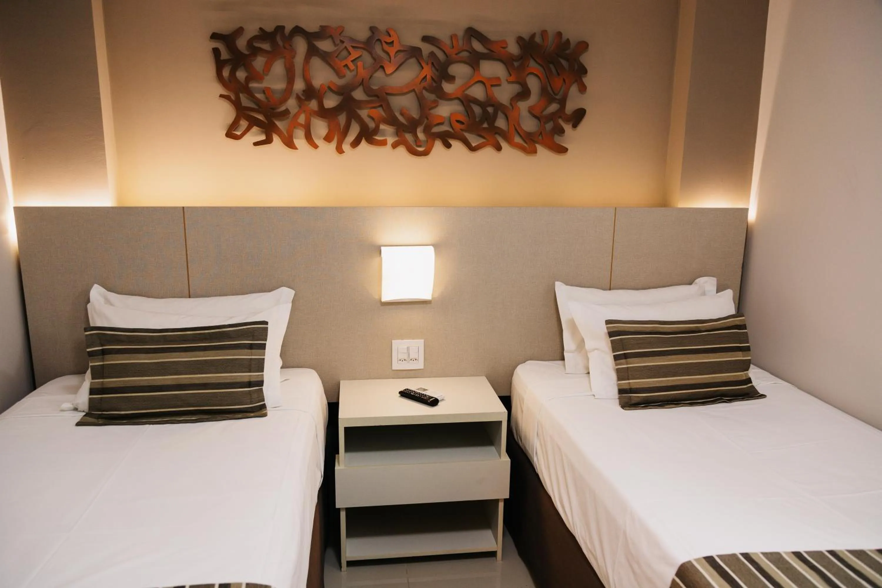 Bed in Lagoon Prime Hotel